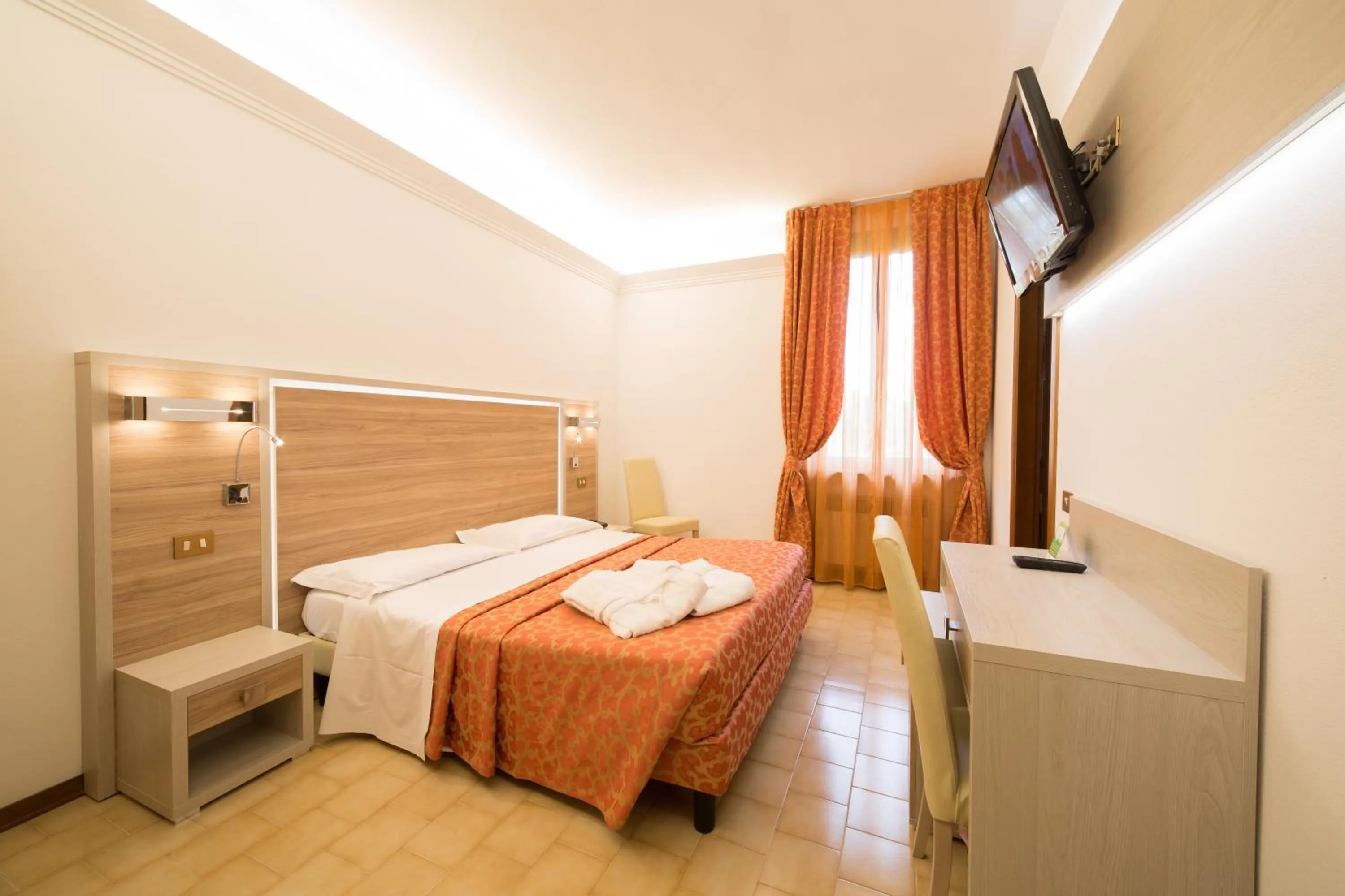 Bed in Hotel Carancini