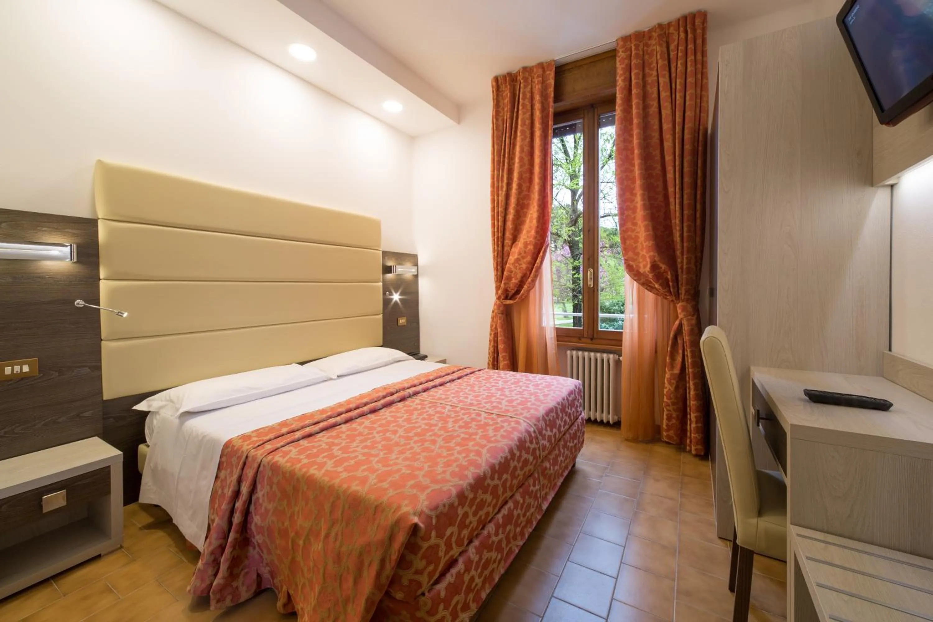 Bed in Hotel Carancini