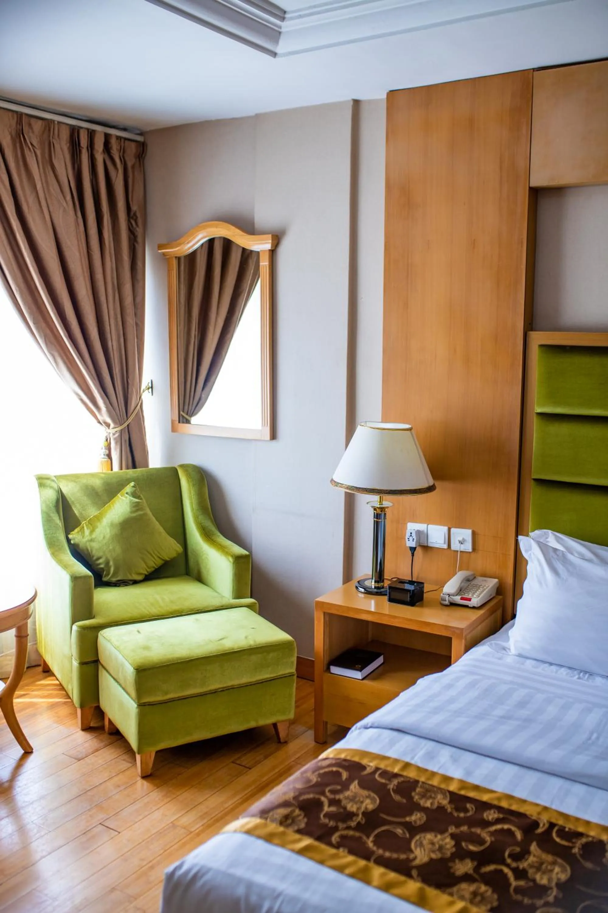 Seating area, Bed in Hotel Sunshine Enugu