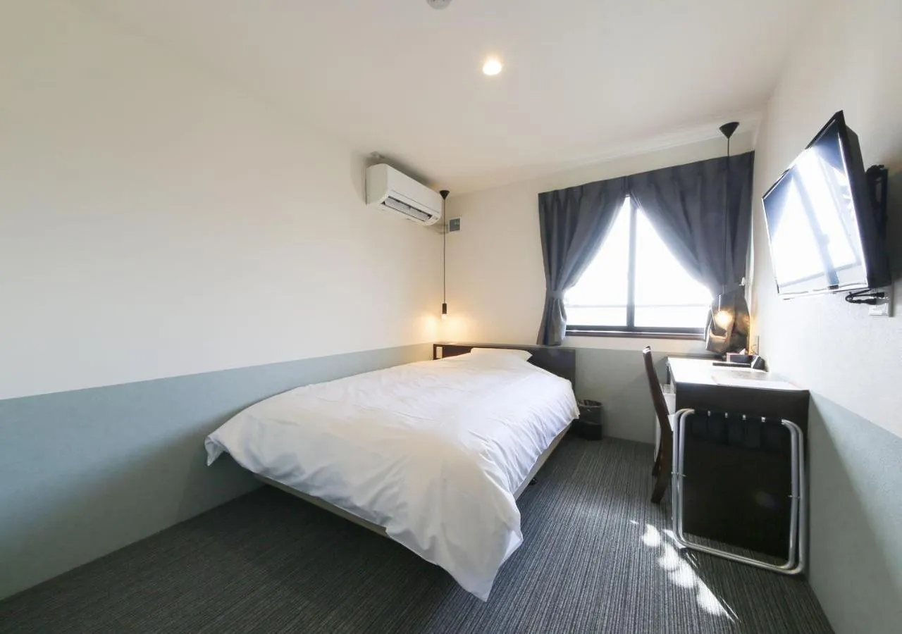 Bed in Hotel Taiyo Nouen Furumitsu