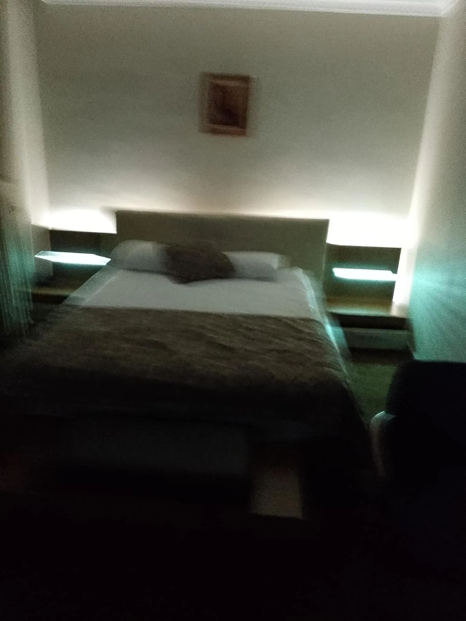 Bed in Tac Hotel