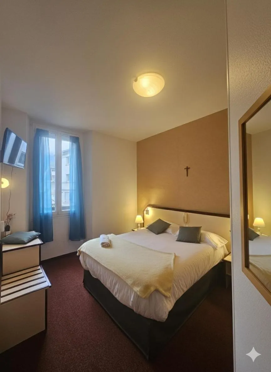 Photo of the whole room, Bed in Hôtel Myosotis