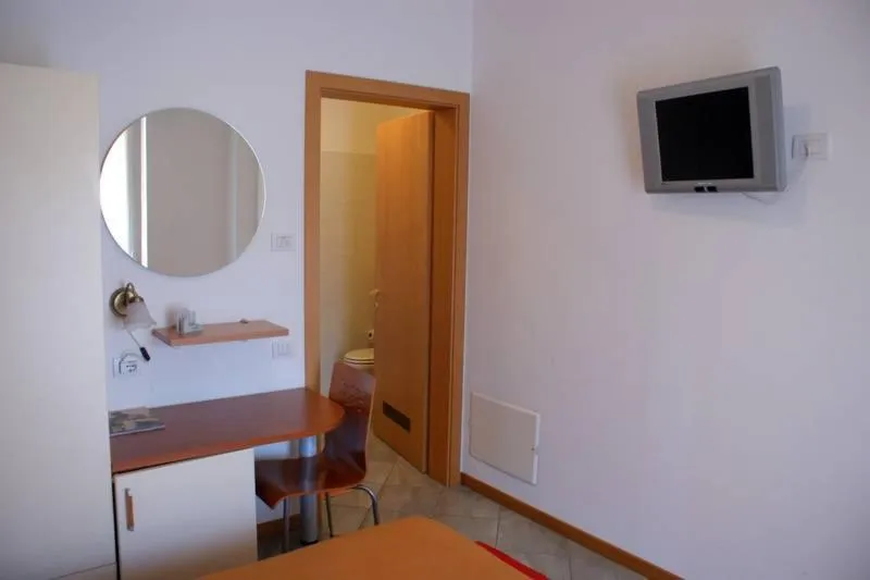 Seating area, Bed in Hotel Il Pino