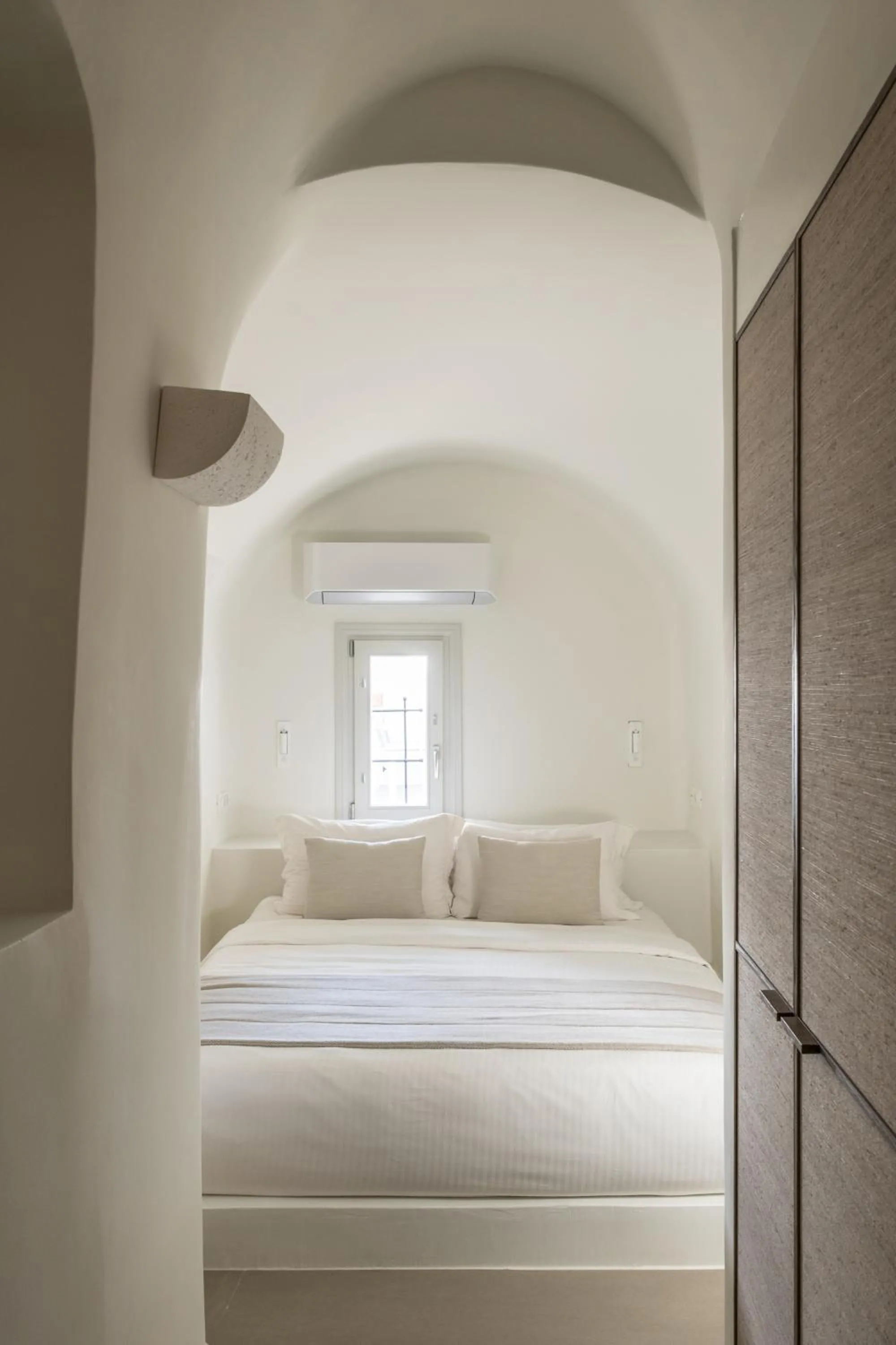 Bed in Enigma Suites