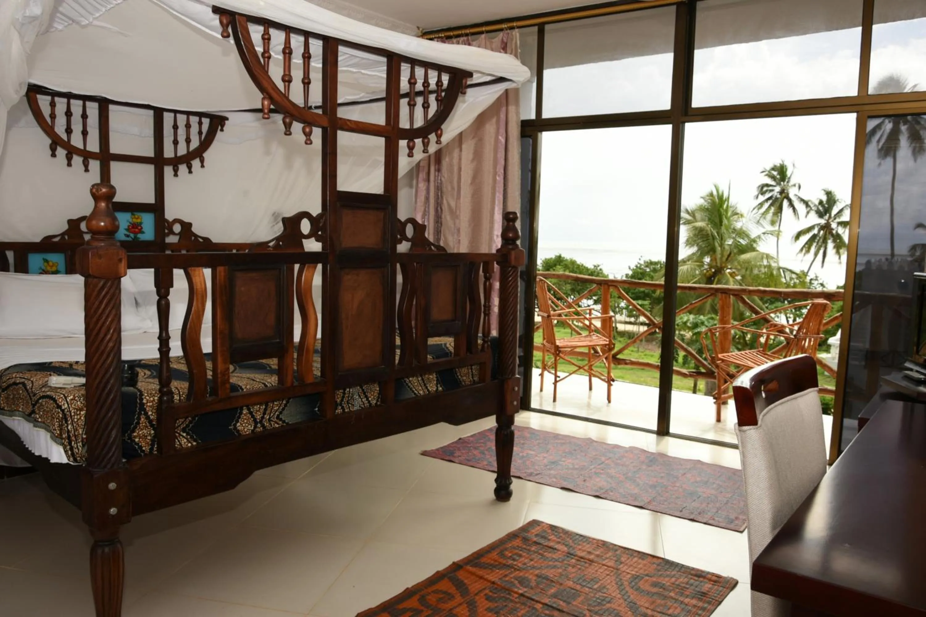 Bed in Coconut Tree Village Beach Resort