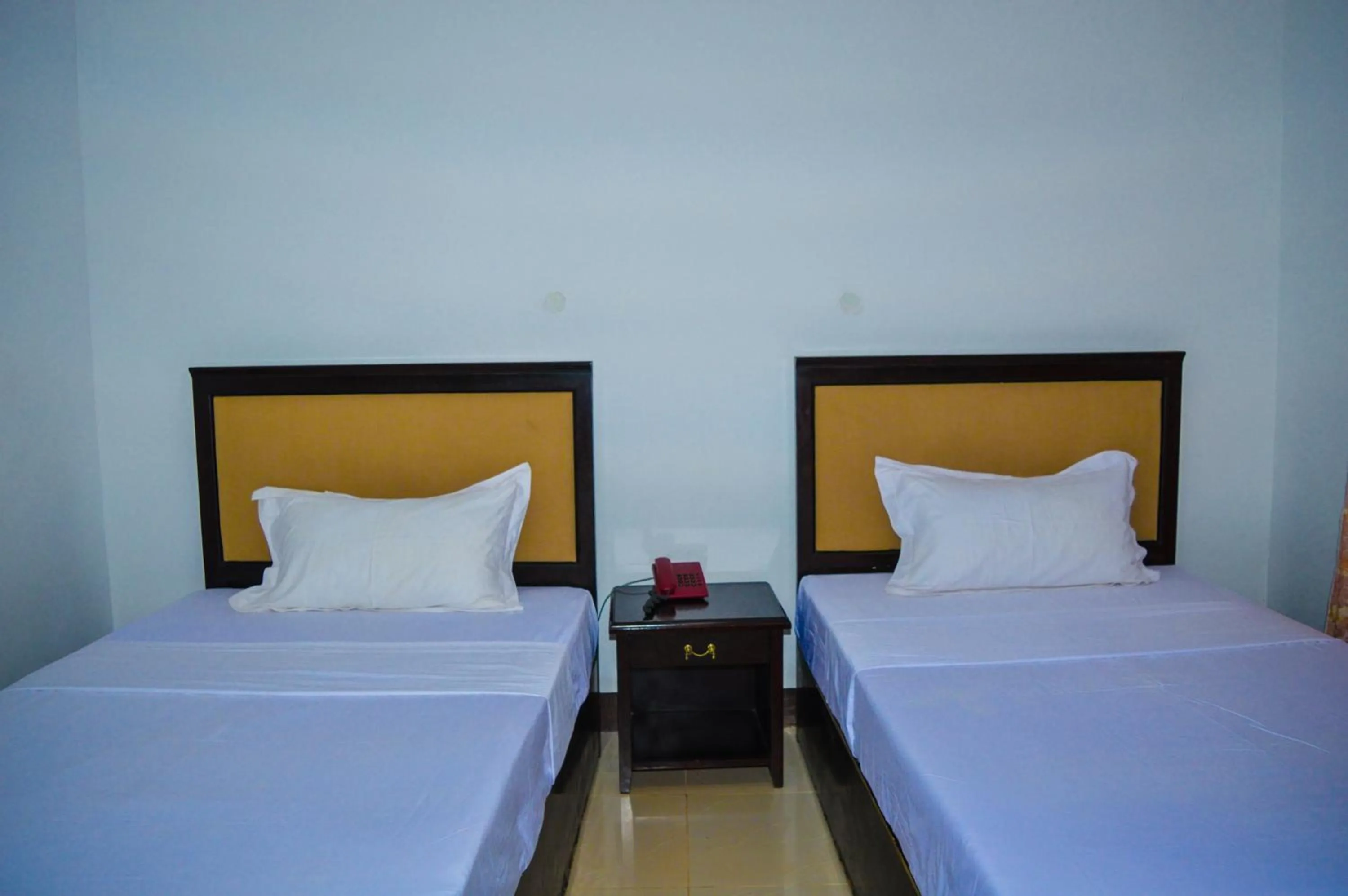Bedroom in Coconut Tree Village Beach Resort