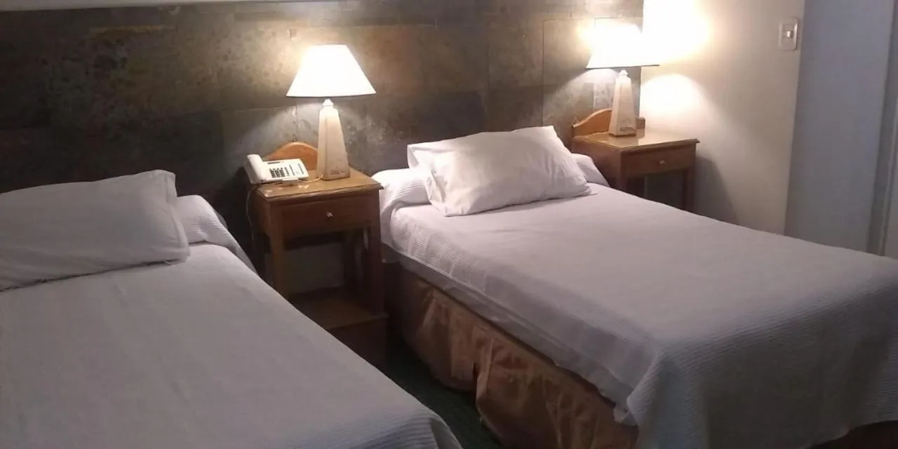Bed in Apart Hotel Maue