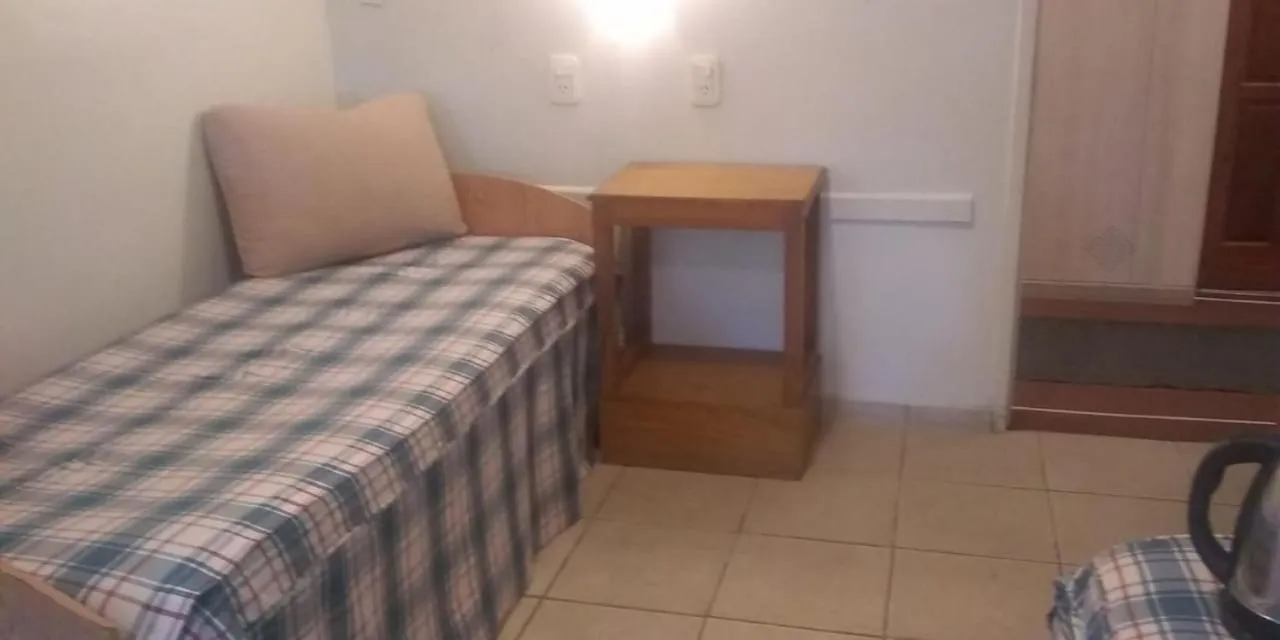 Bed in Apart Hotel Maue