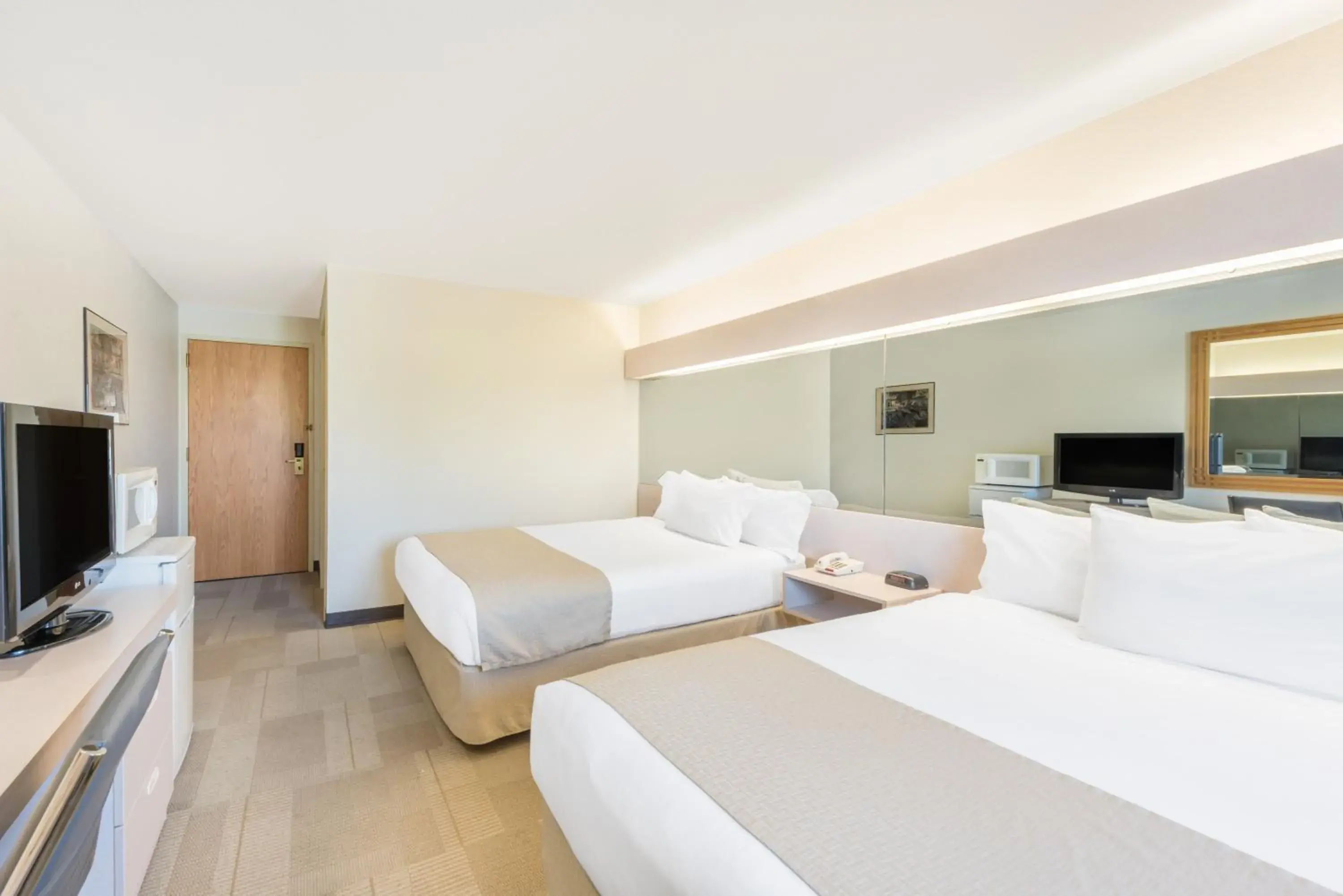 Bed in Microtel Inn & Suites by Wyndham Sainte Genevieve Bed in Microtel Inn & Suites by Wyndham Sainte Genevieve