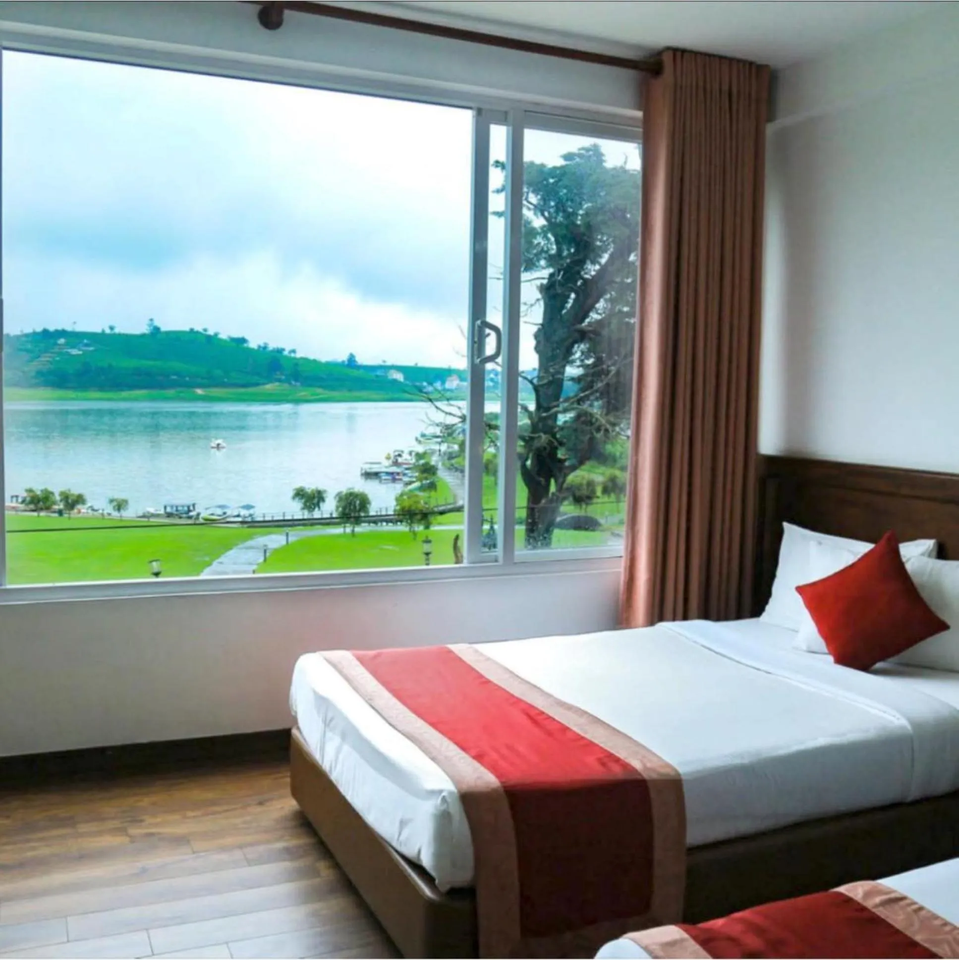 Bed in Royal Lake Hotel