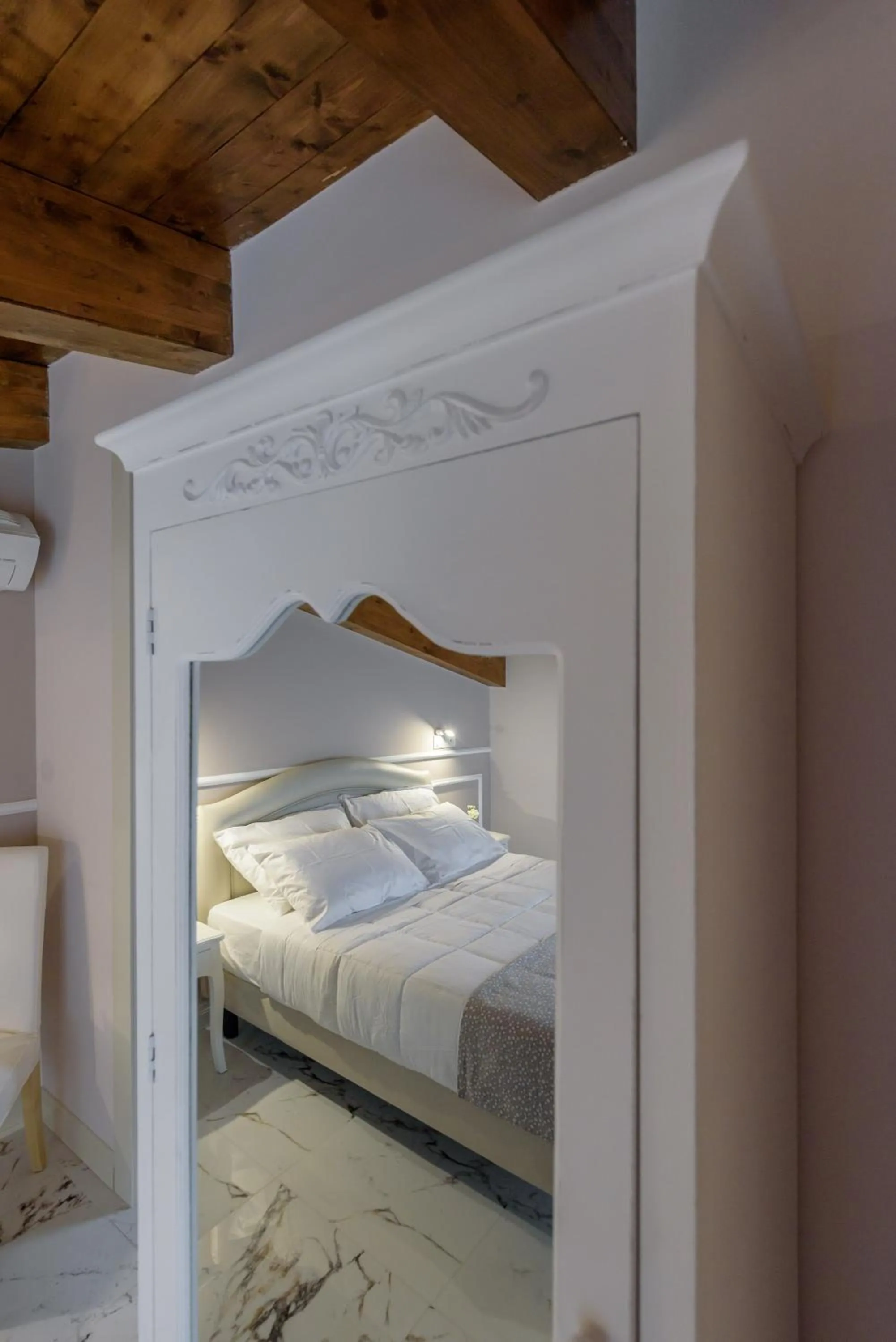 Bed in Marie Claire Apartments & Spa