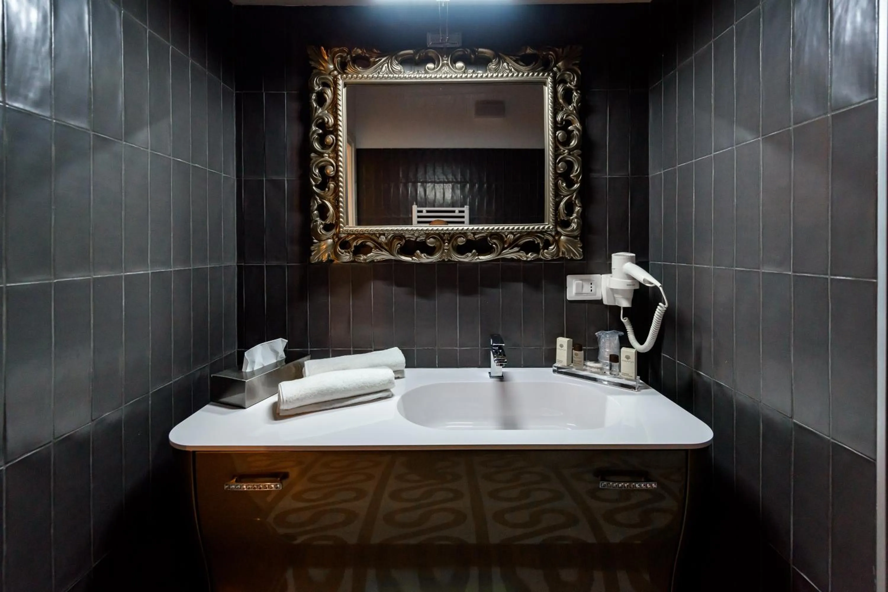 Bathroom in Marie Claire Apartments & Spa