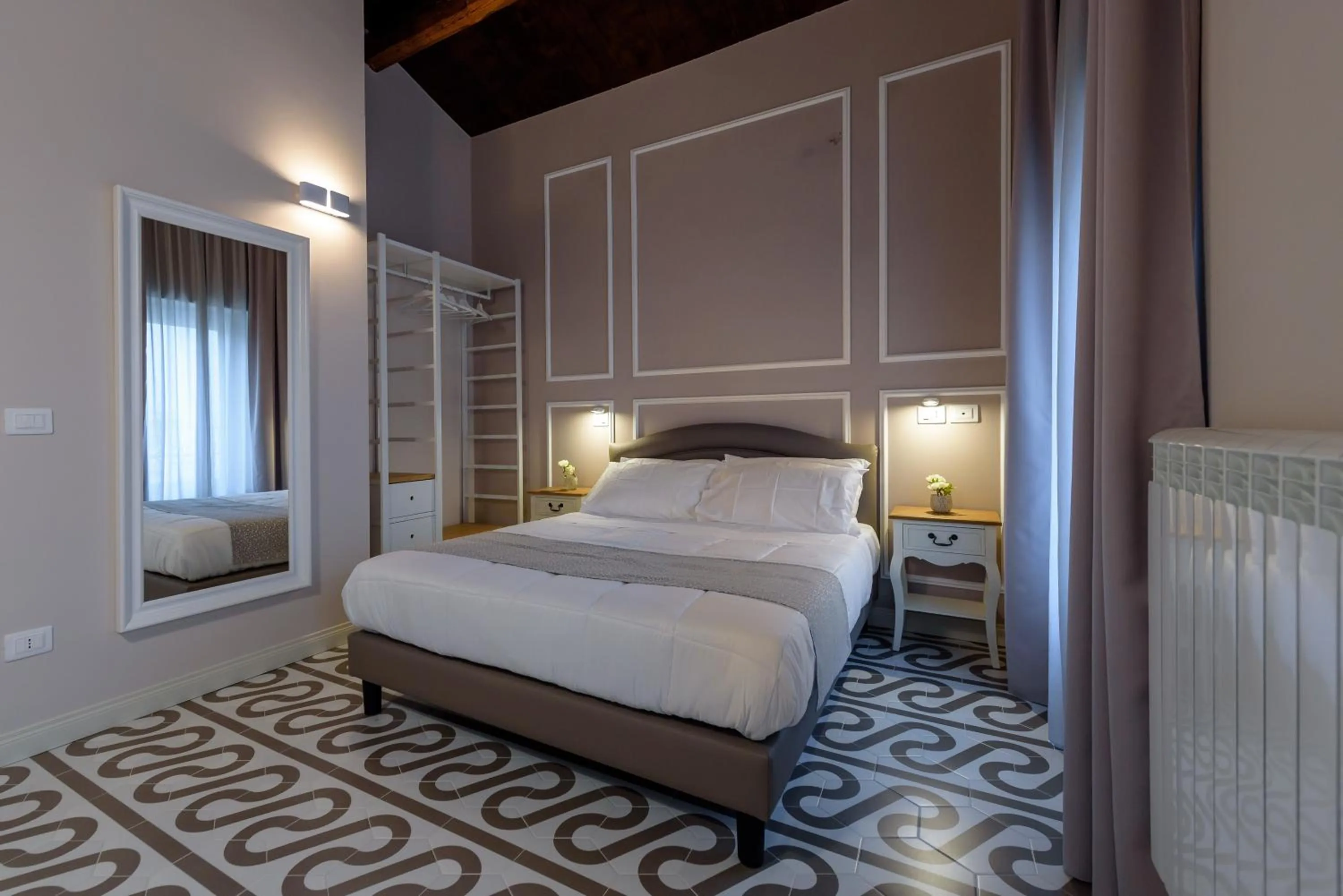 Bed in Marie Claire Apartments & Spa