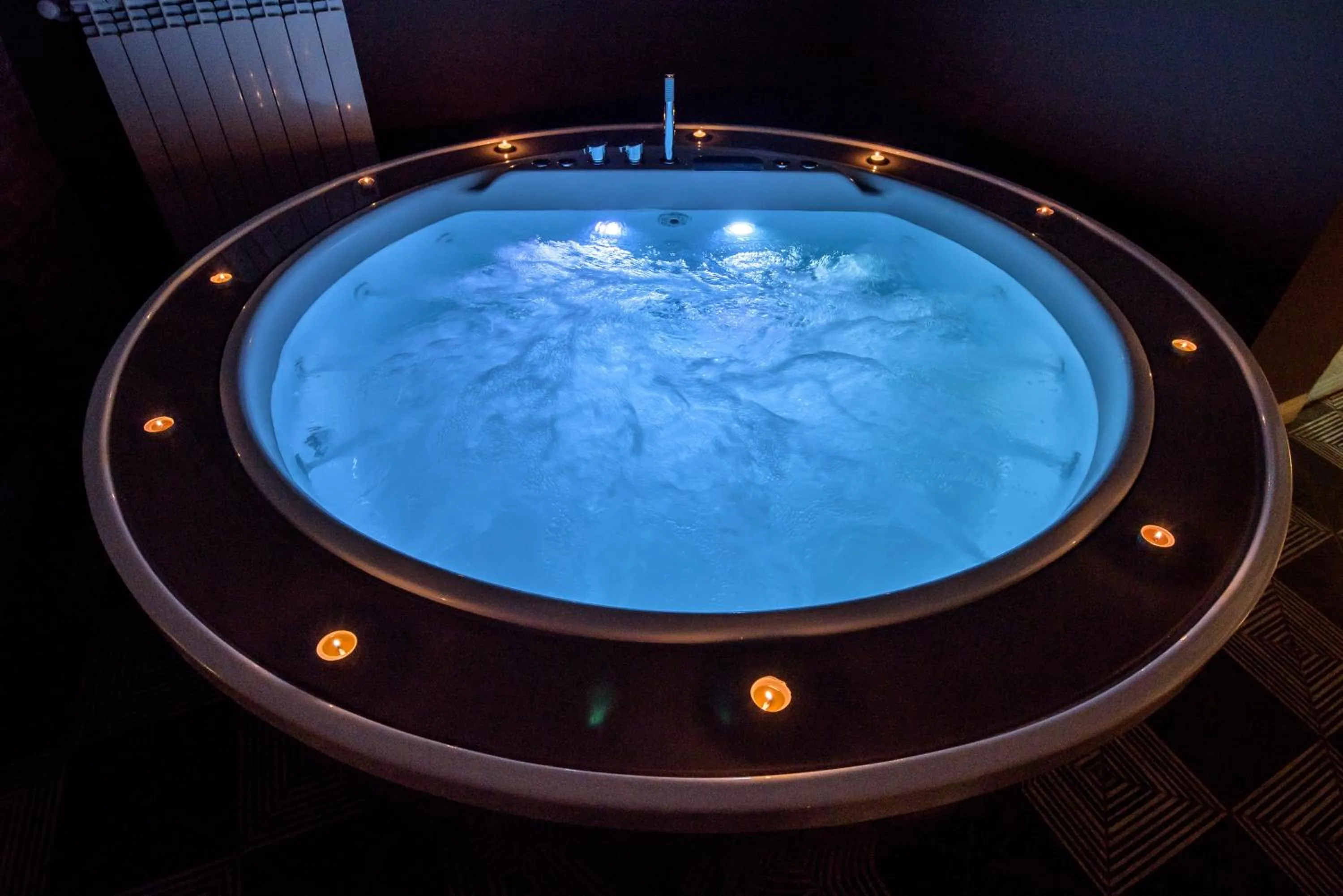 Swimming pool in Marie Claire Apartments & Spa