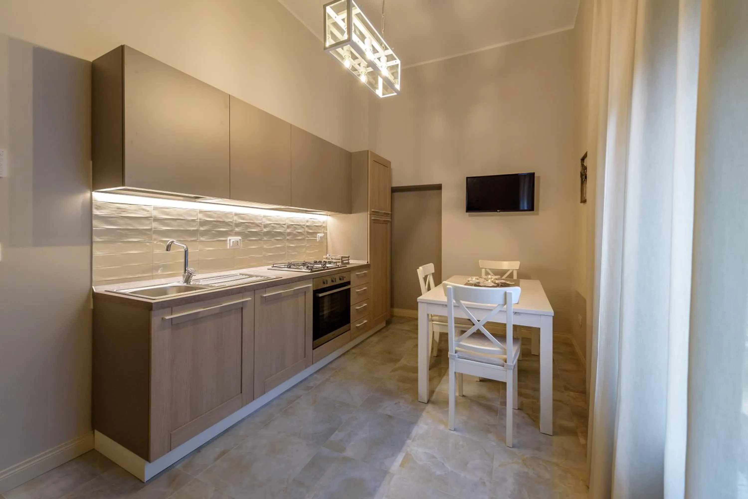 TV and multimedia in Marie Claire Apartments & Spa