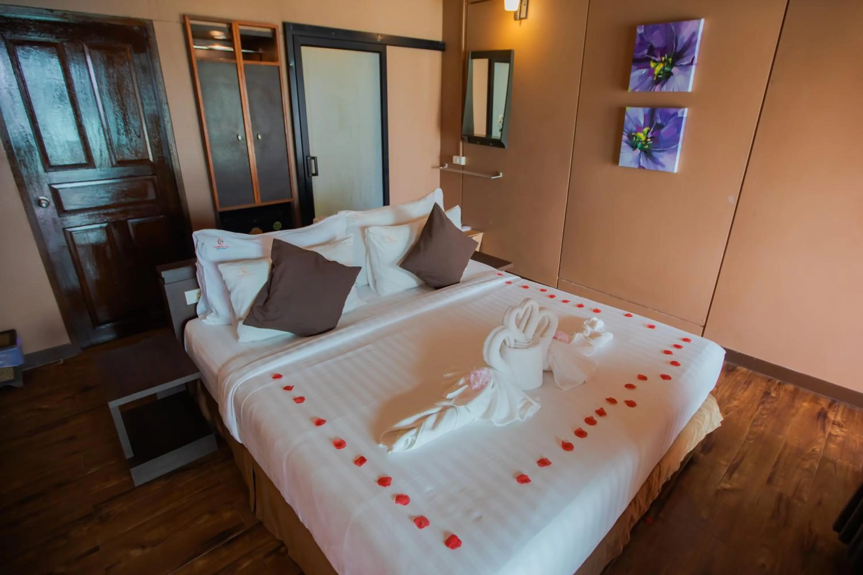 Bed in Chareena Hill Beach Resort