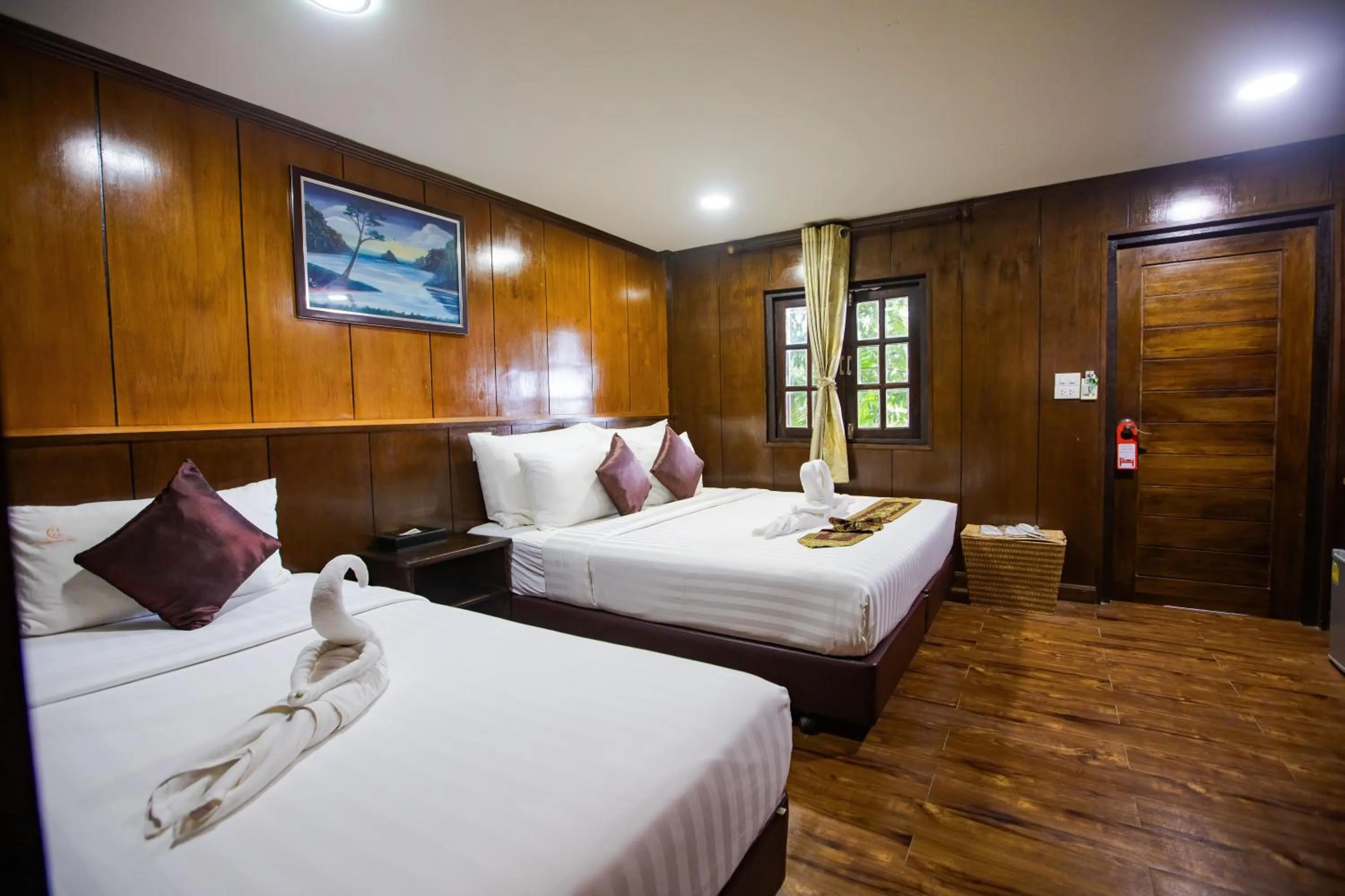 Bed in Chareena Hill Beach Resort
