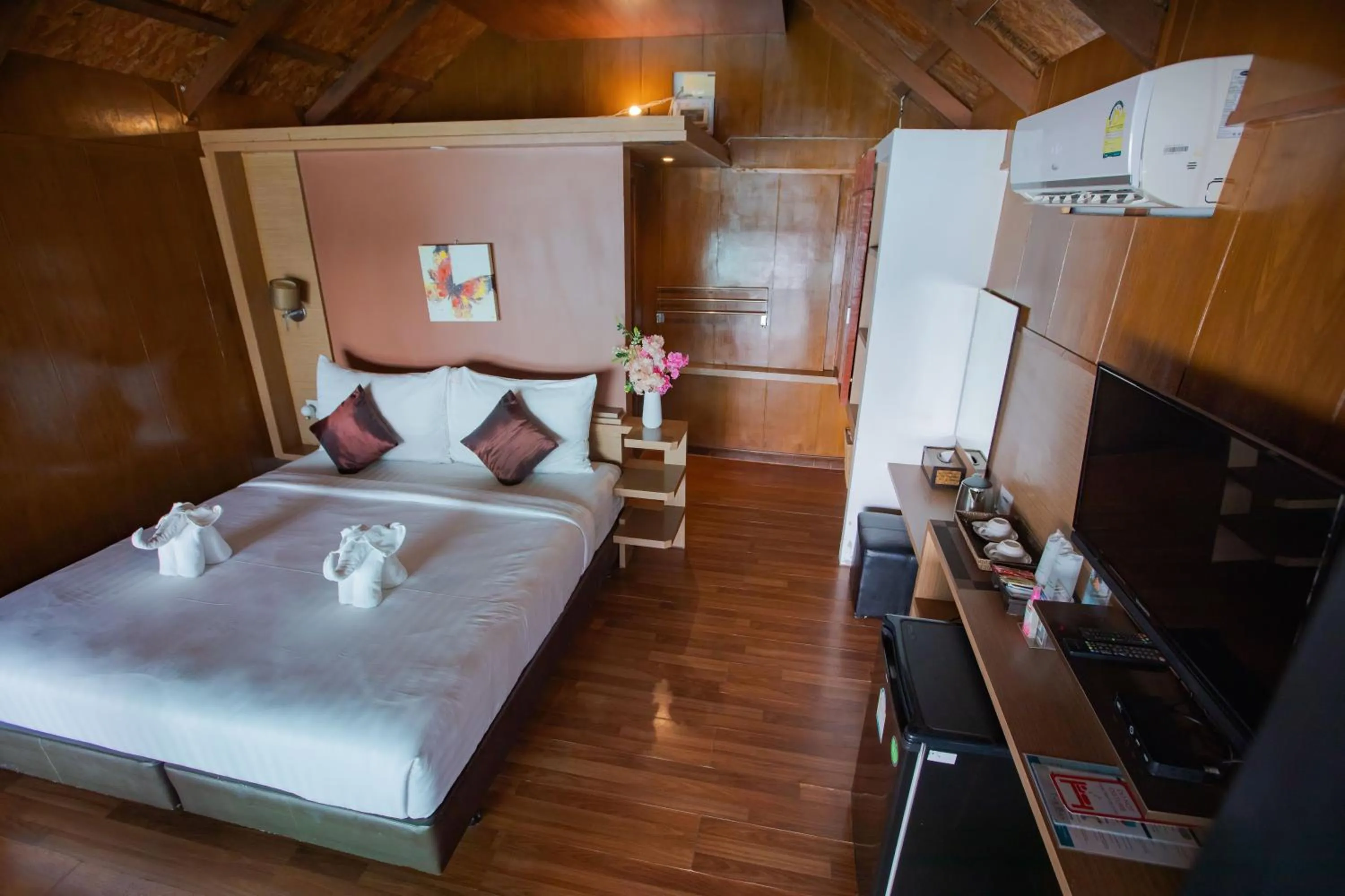 Bed in Chareena Hill Beach Resort