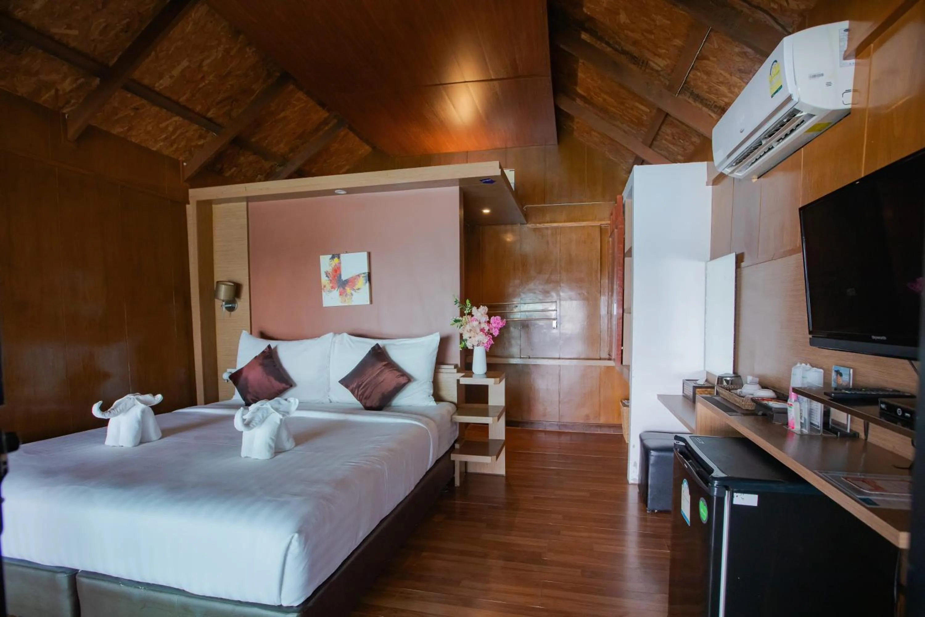 Bed in Chareena Hill Beach Resort