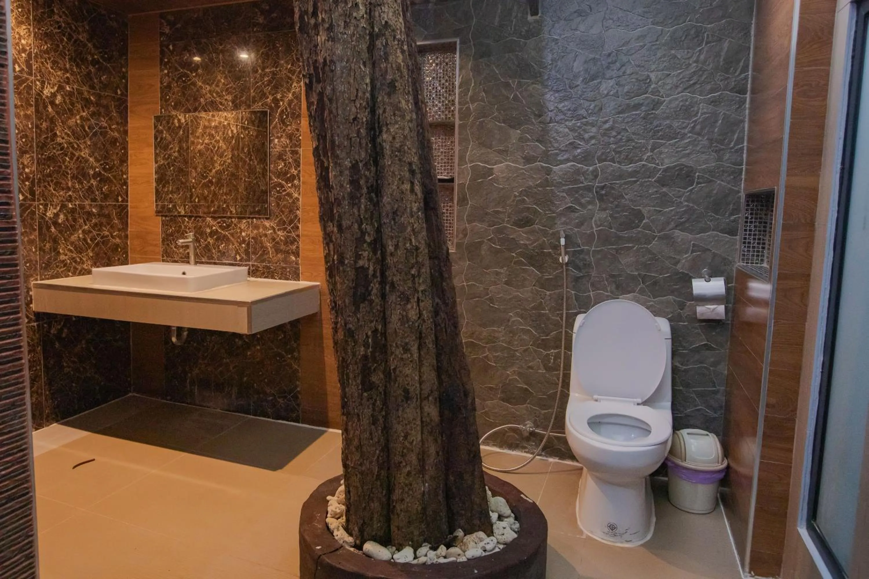 Toilet in Chareena Hill Beach Resort