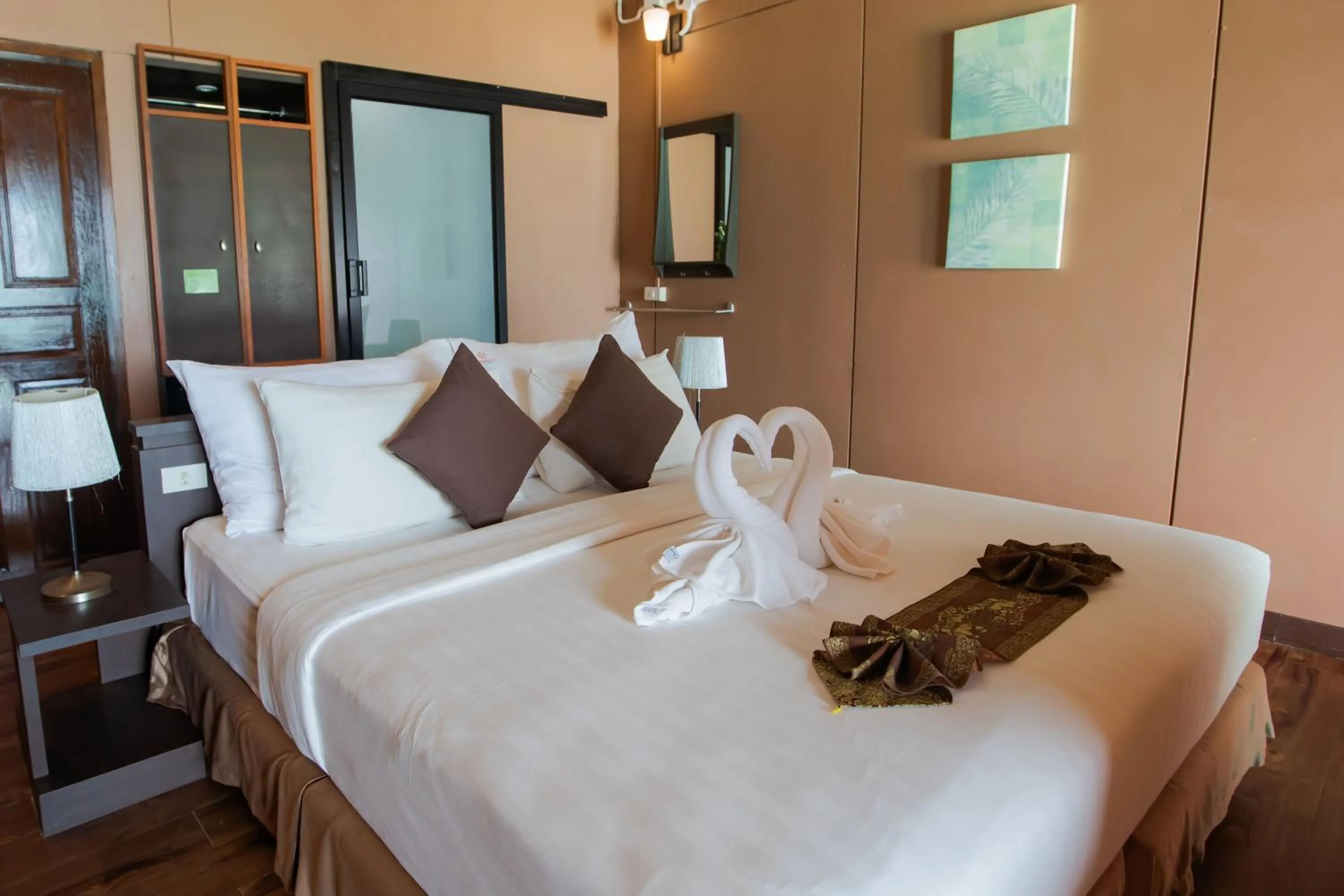 Bed in Chareena Hill Beach Resort