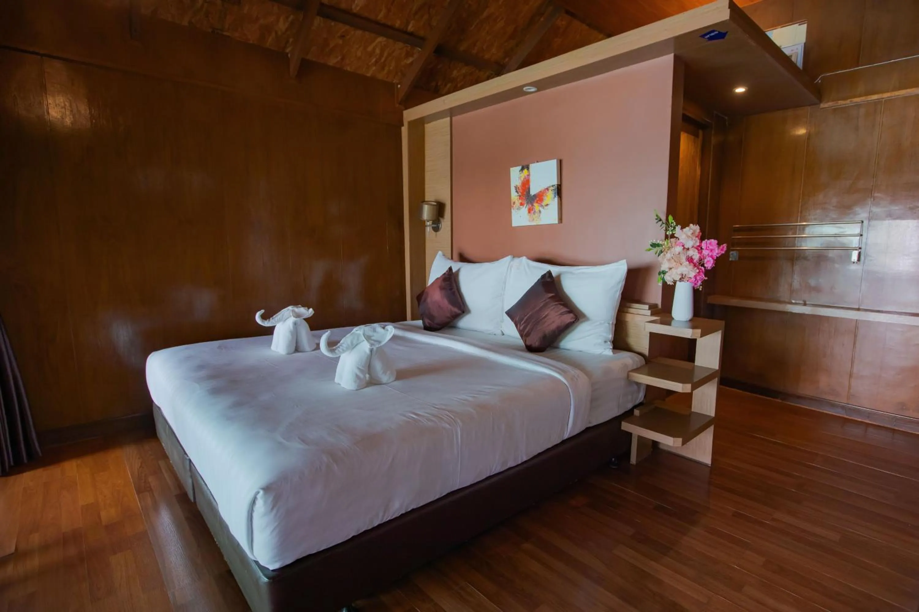 Bed in Chareena Hill Beach Resort