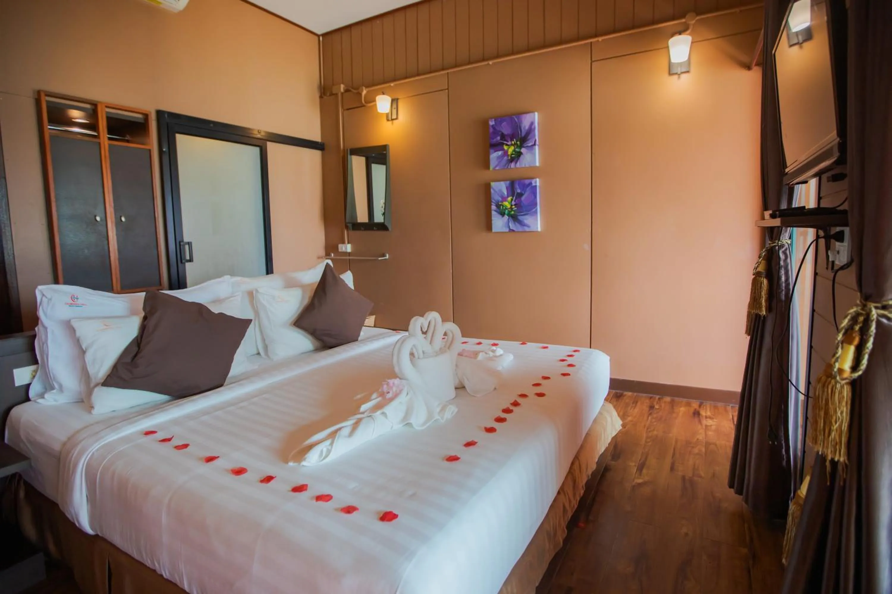 Bed in Chareena Hill Beach Resort