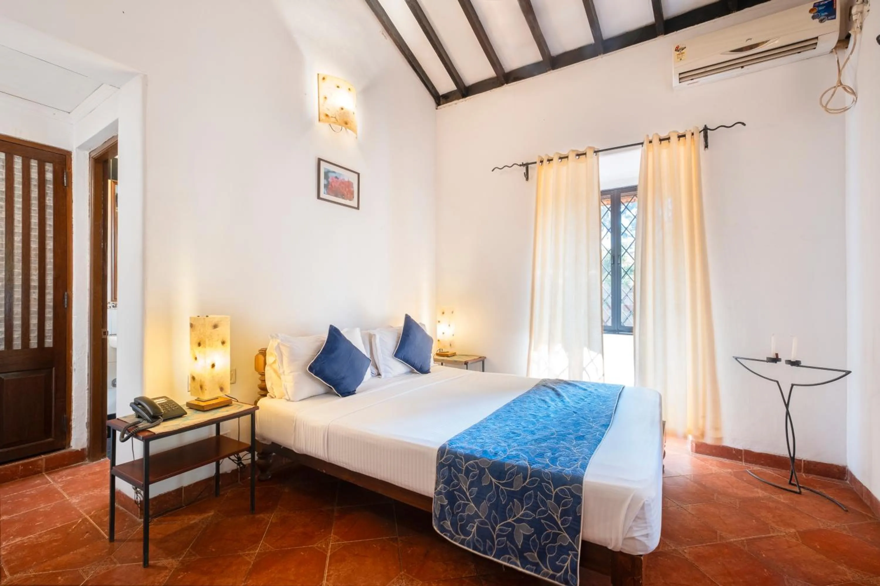 Photo of the whole room, Bed in Granpa's Inn Hotel Bougainvillea
