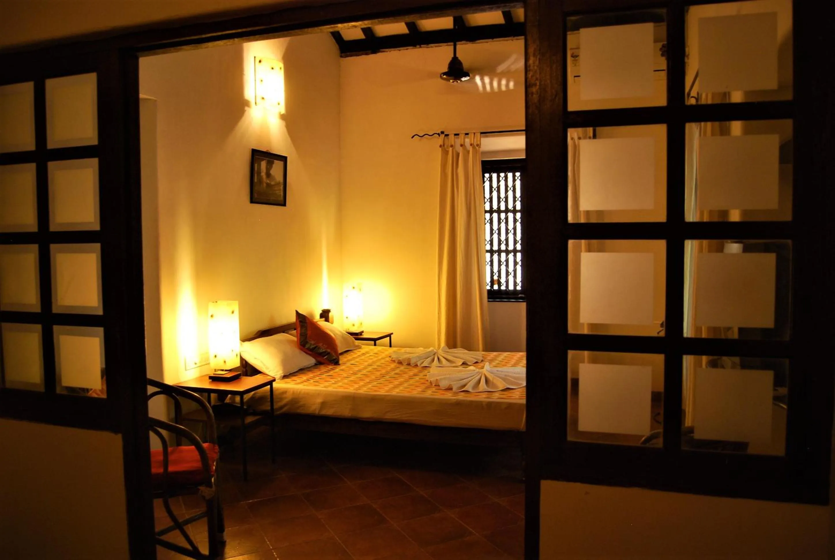 Bed in Granpa's Inn Hotel Bougainvillea