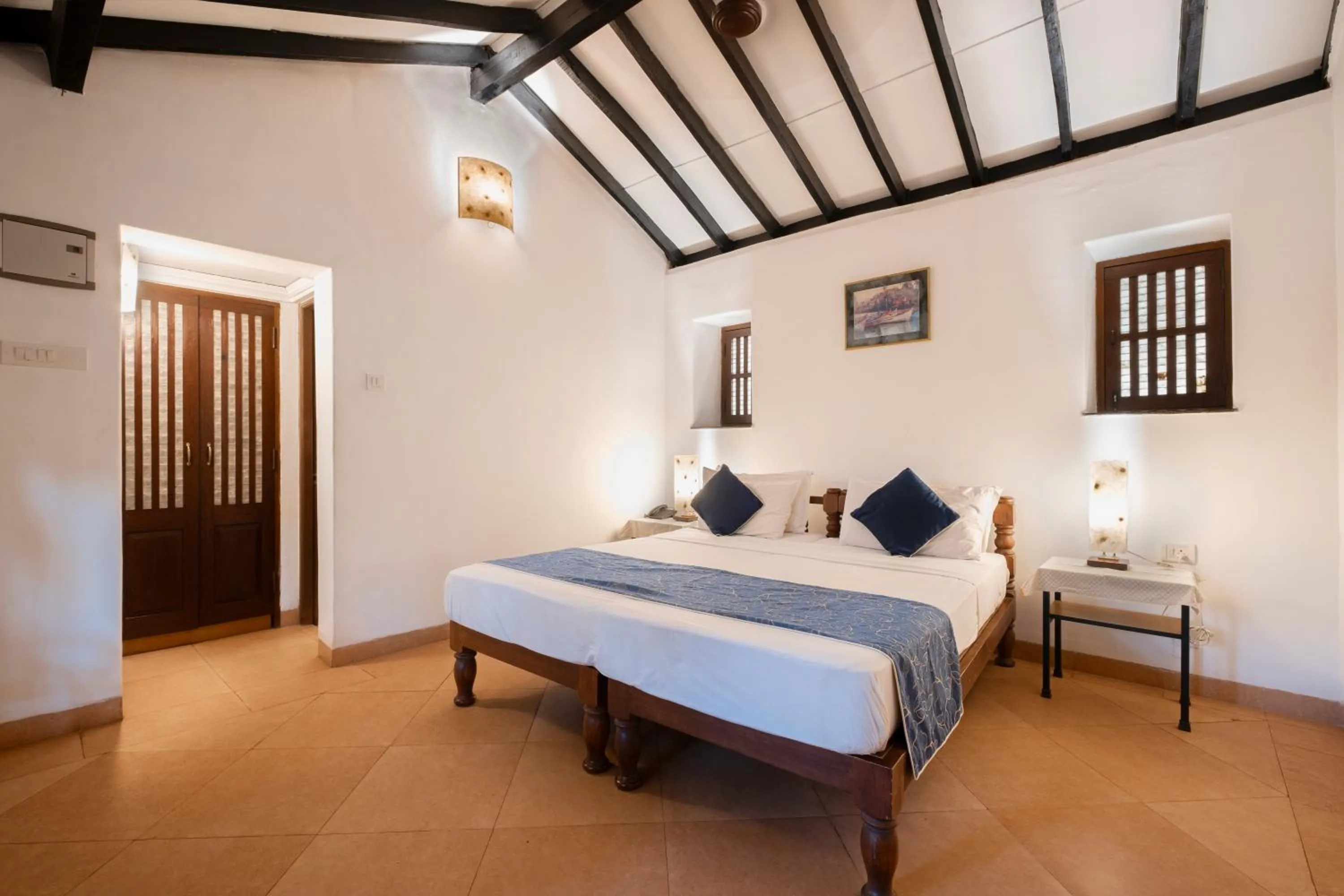 Bed in Granpa's Inn Hotel Bougainvillea