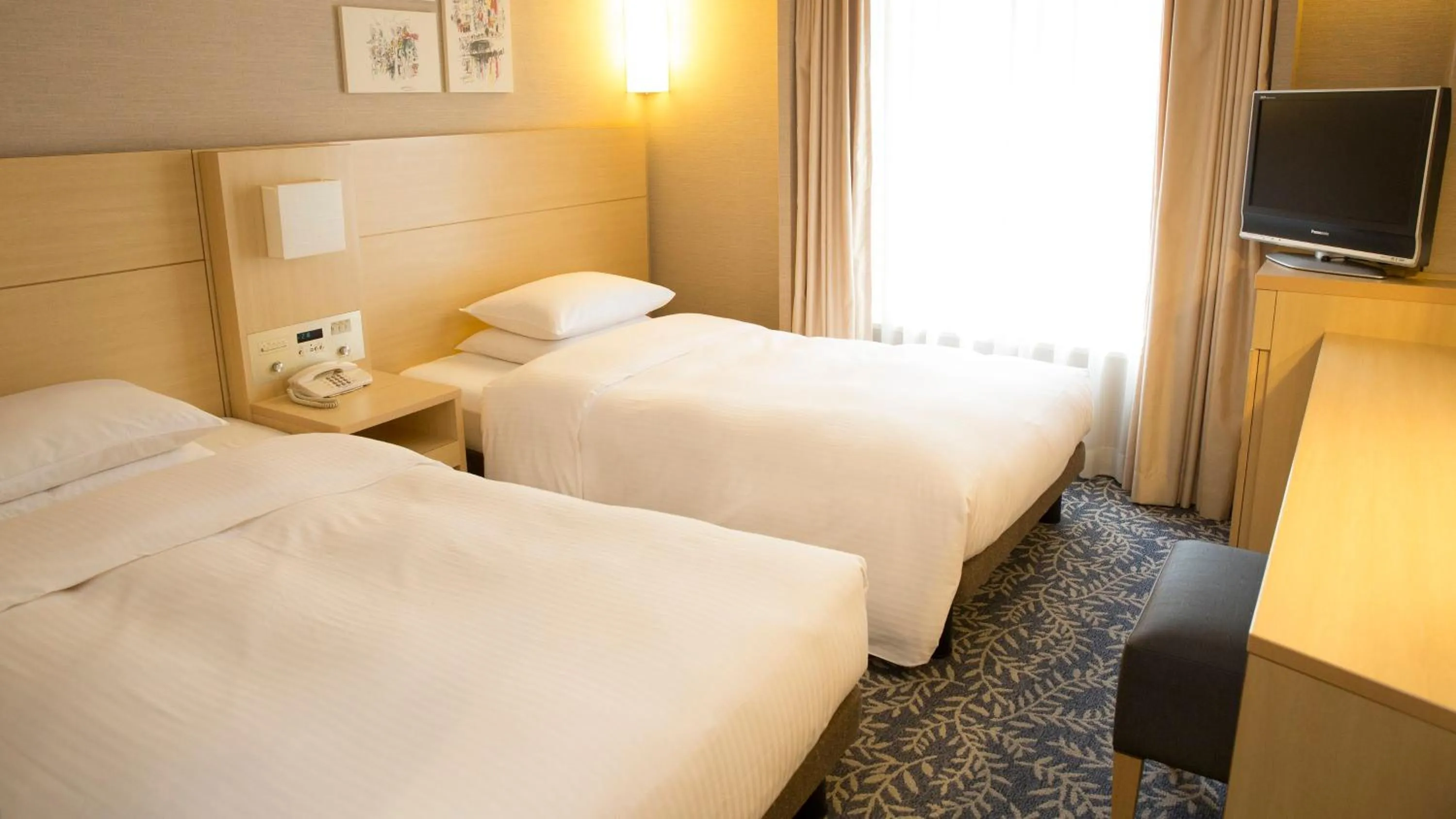 Photo of the whole room, Bed in RIHGA Royal Hotel Osaka, Vignette Collection by IHG