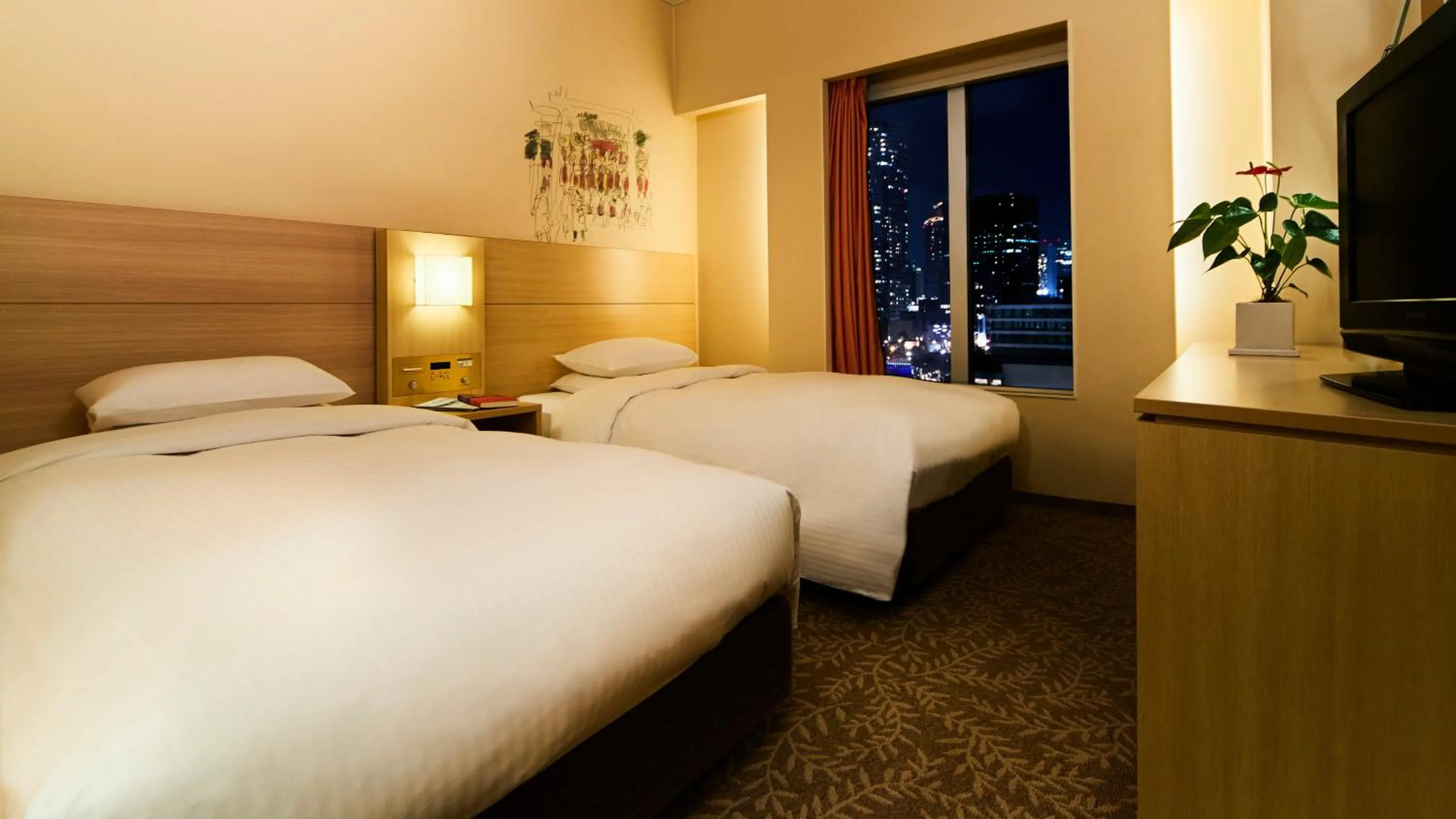 Photo of the whole room, Bed in RIHGA Royal Hotel Osaka, Vignette Collection by IHG