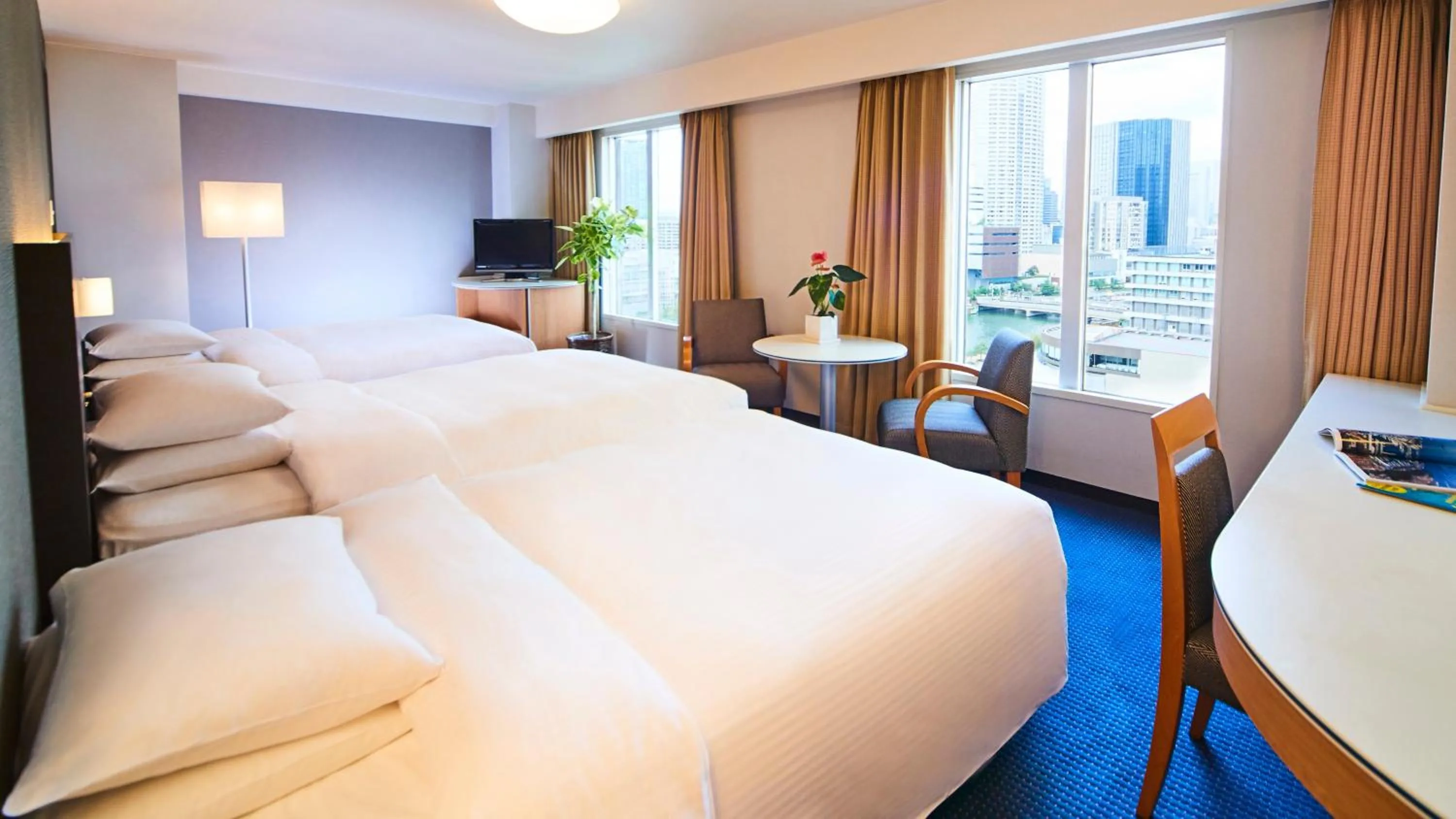 Photo of the whole room, Bed in RIHGA Royal Hotel Osaka, Vignette Collection by IHG