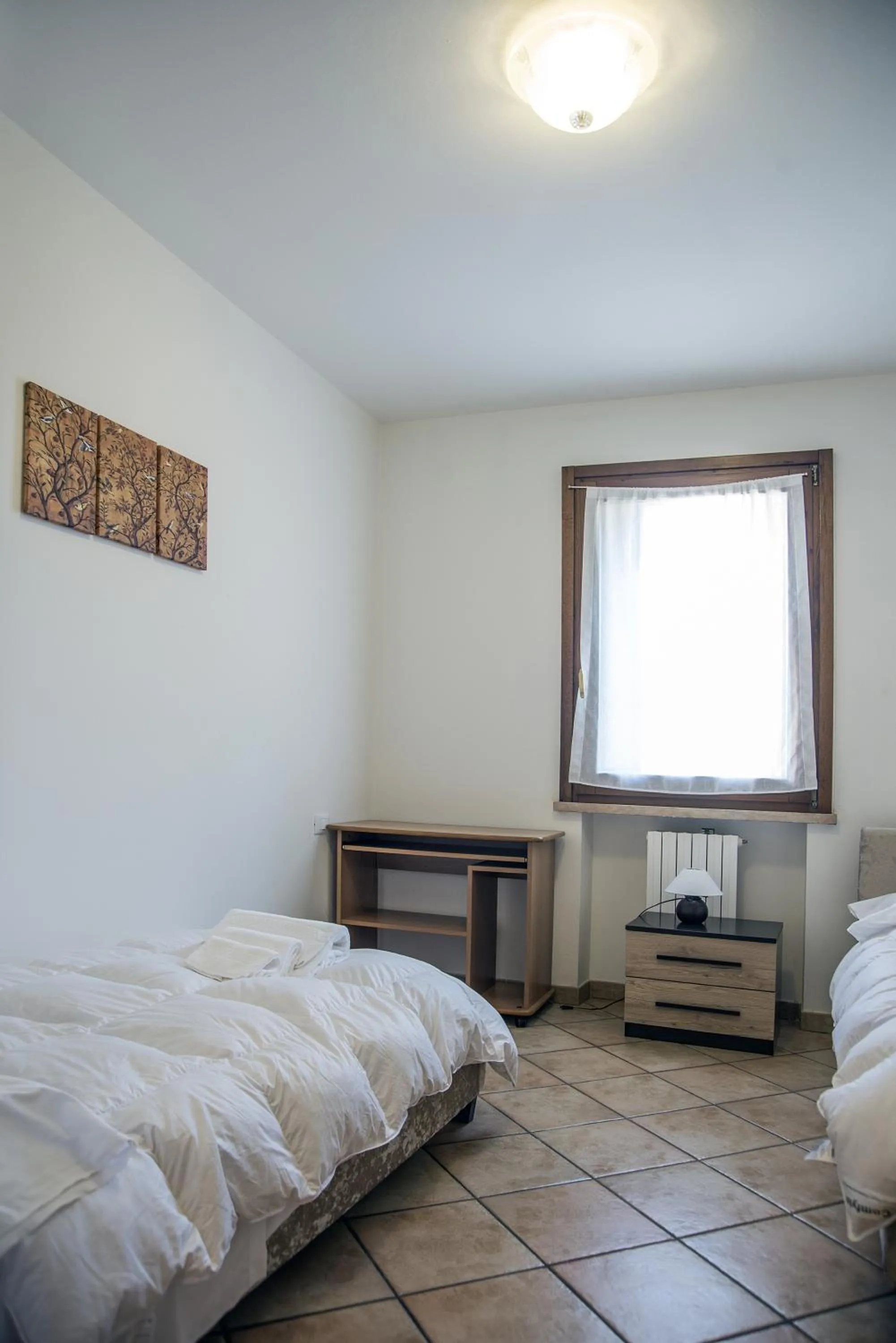 Photo of the whole room, Bed in Residenza Meeting