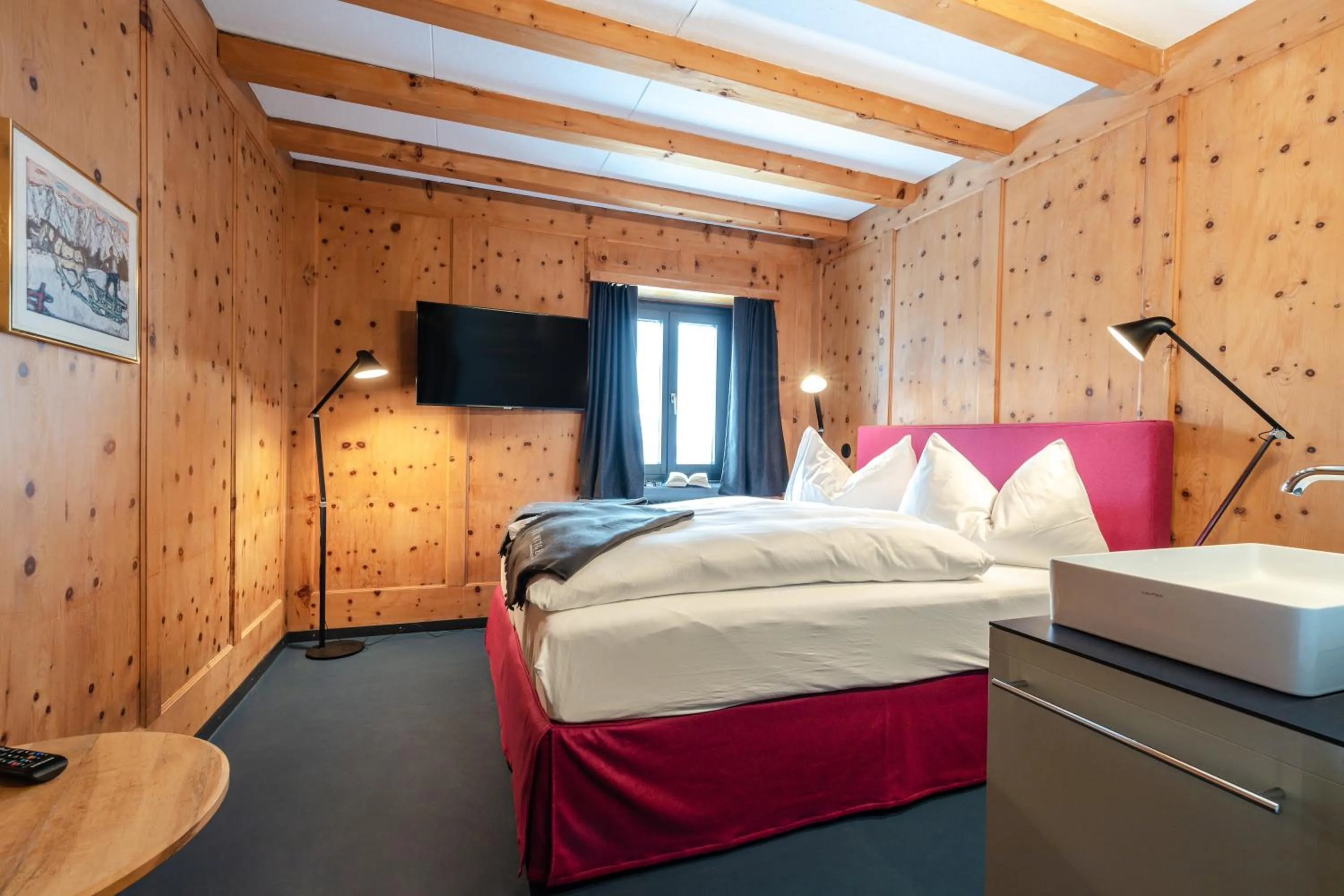 Bed in Hotel Piz Mitgel