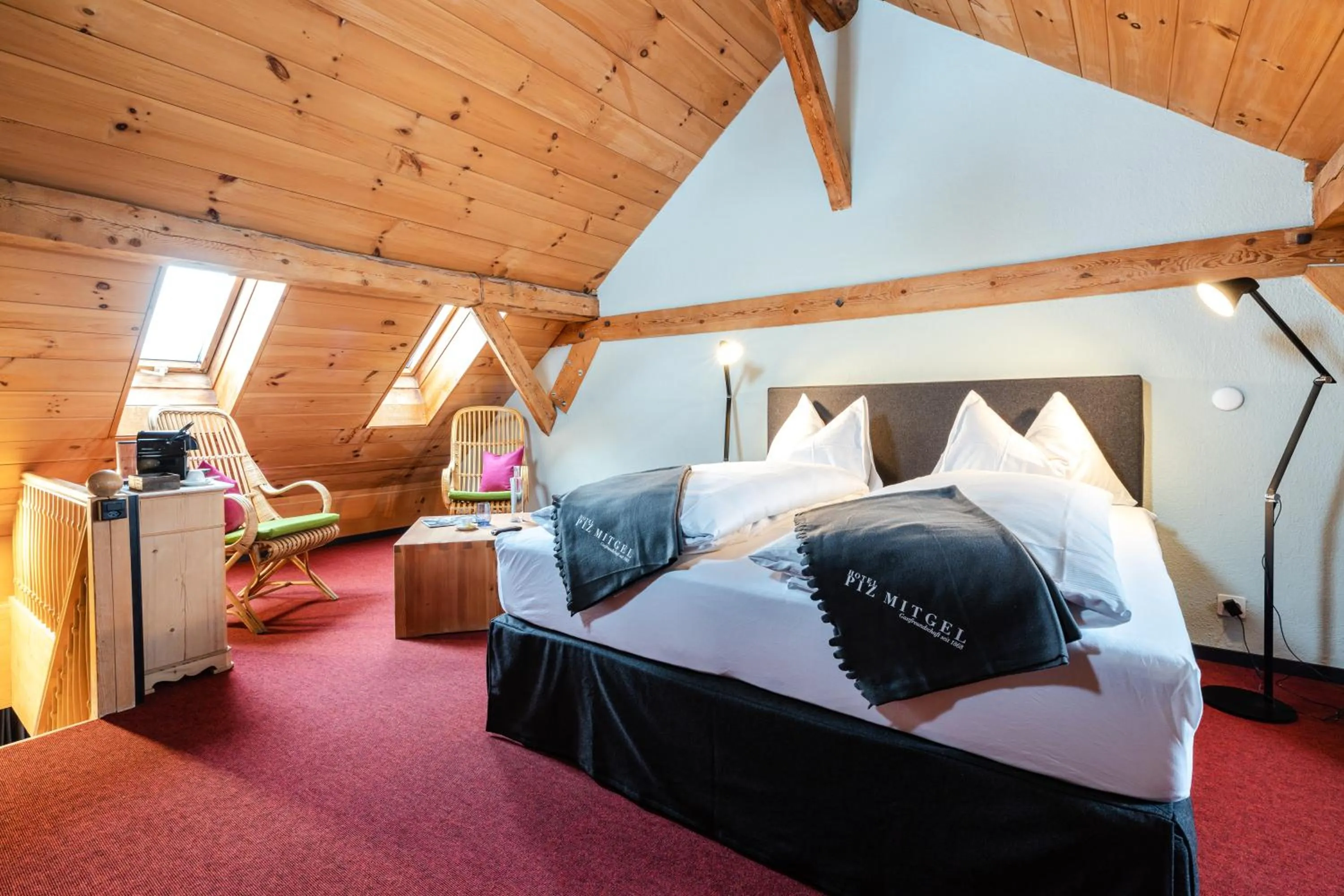 Bed in Hotel Piz Mitgel