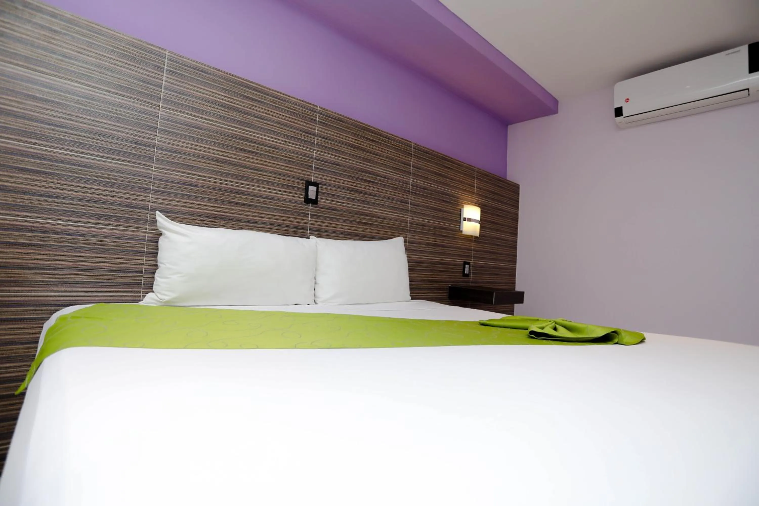 Bed in Hotel Kavia