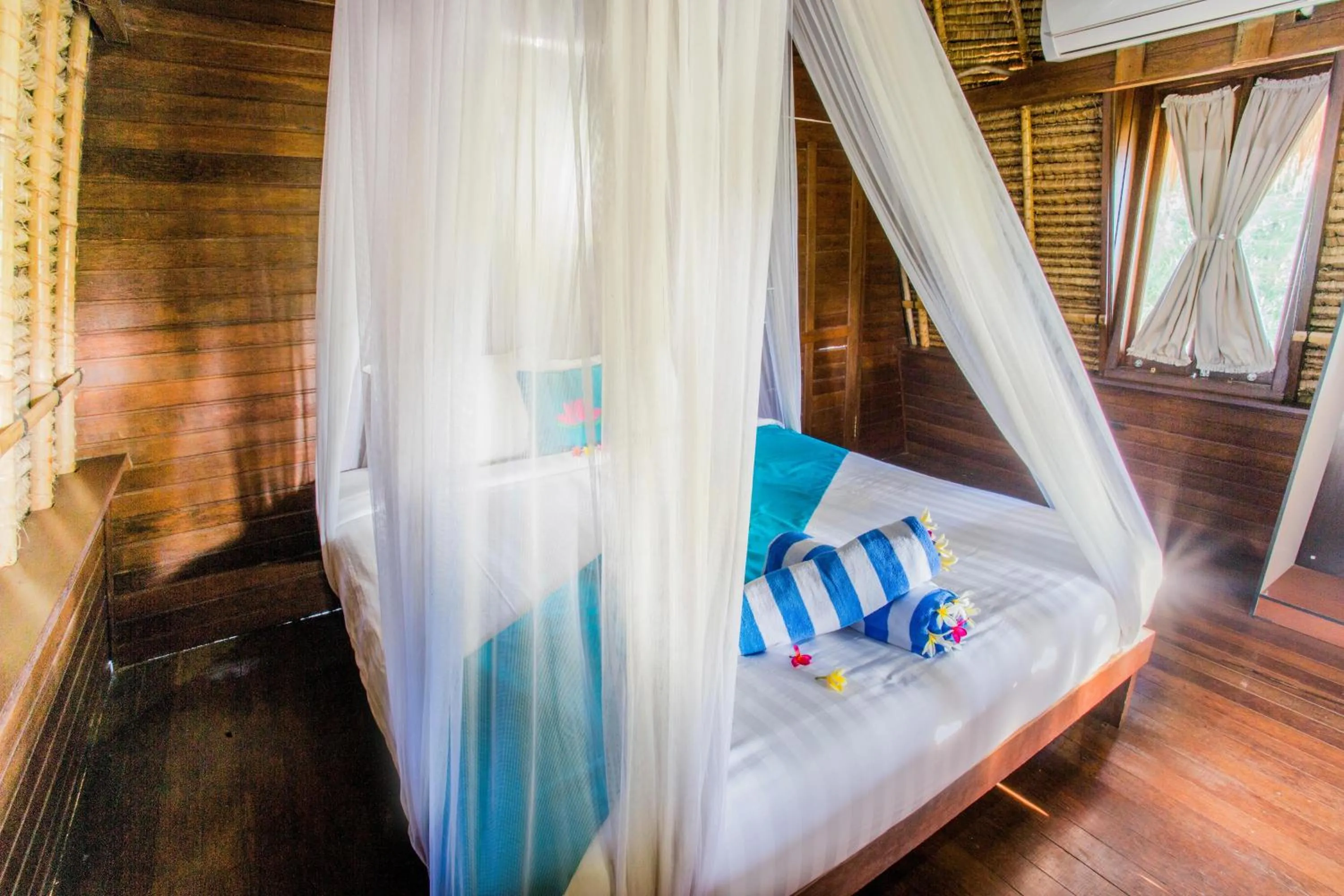 Bed in Lotus Garden Huts