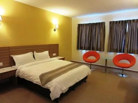 Bed in Grand Court Hotel