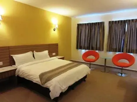 Bed in Grand Court Hotel Bed in Grand Court Hotel