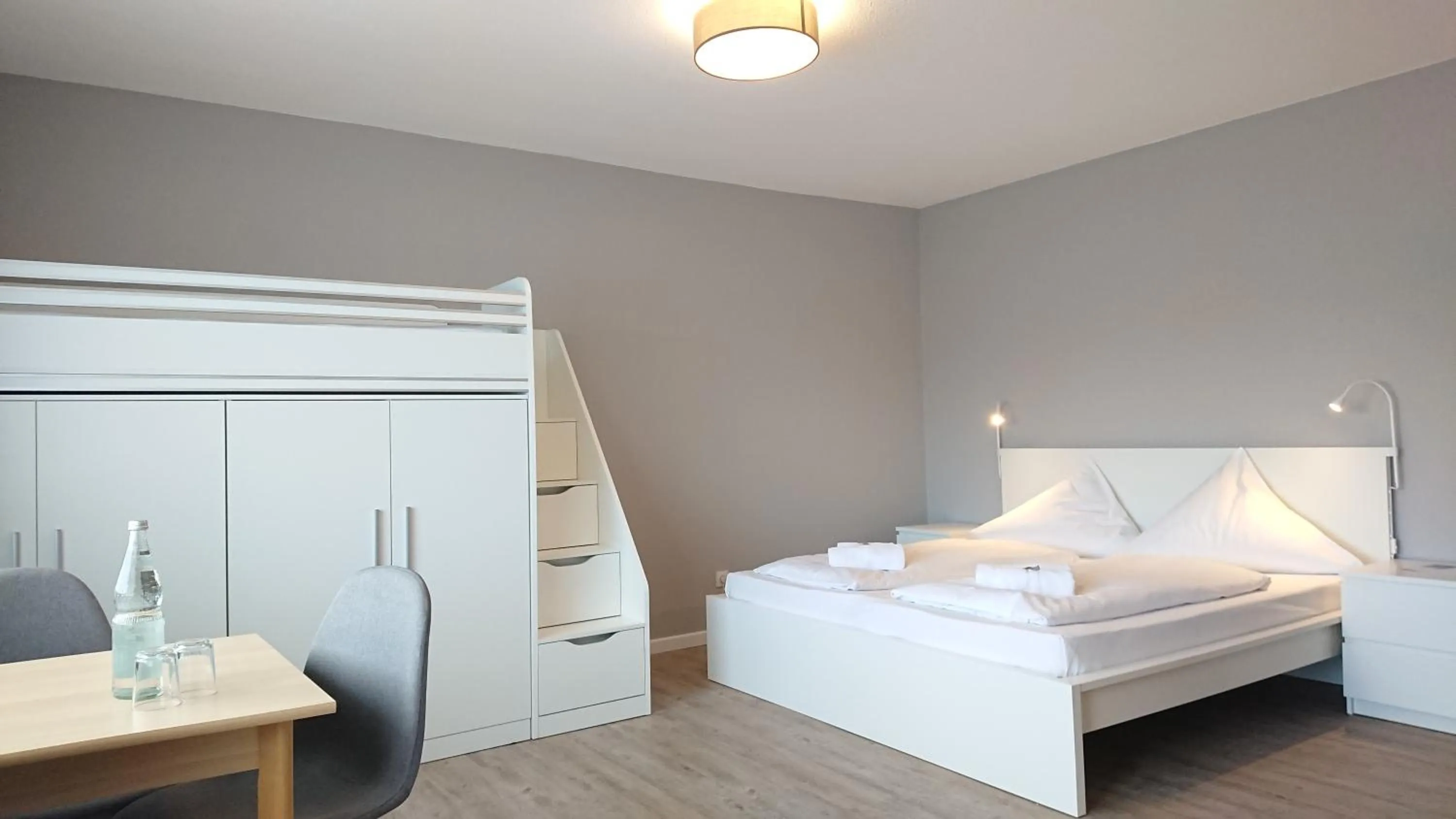 Living room, Bed in Ostseehotel Kappeln by team SchleiFee