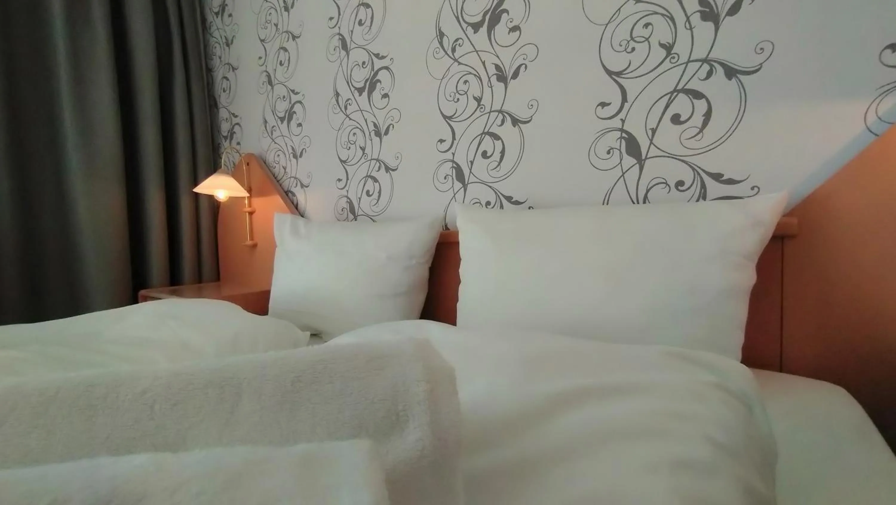 Bed in Ostseehotel Kappeln by team SchleiFee