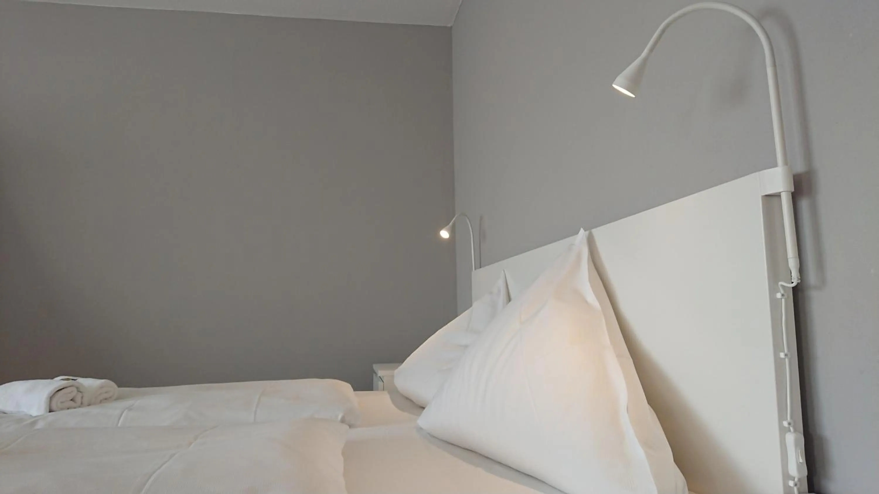 Bed in Ostseehotel Kappeln by team SchleiFee