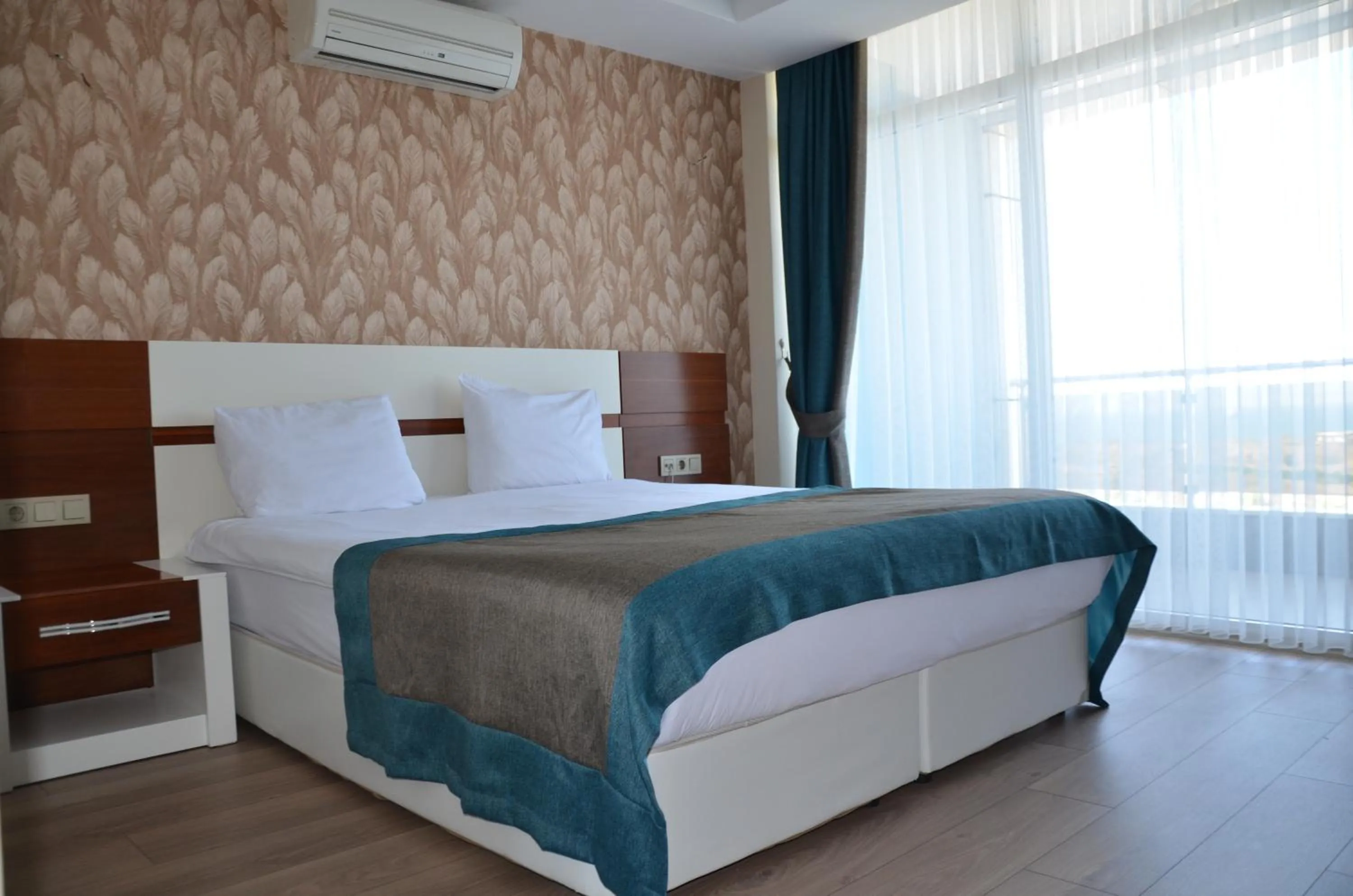 Decorative detail, Bed in Grand Ahos Hotel