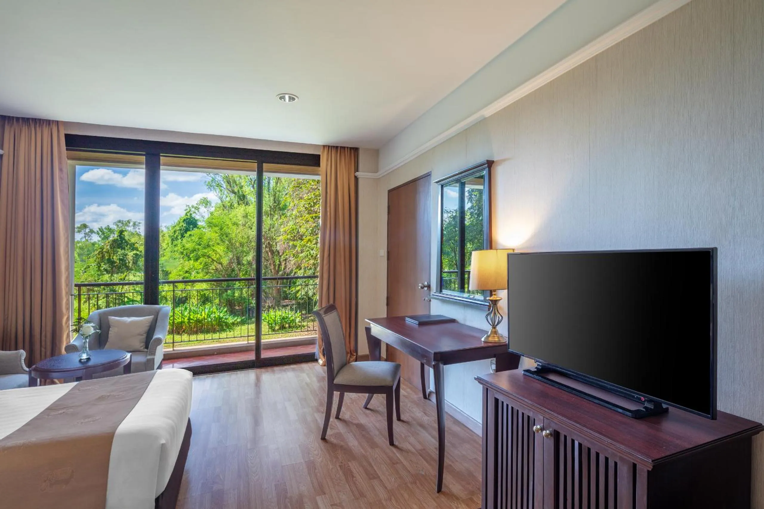 Bed in Tawa Ravadee Resort Prachinburi, a member of WorldHotels Distinctive