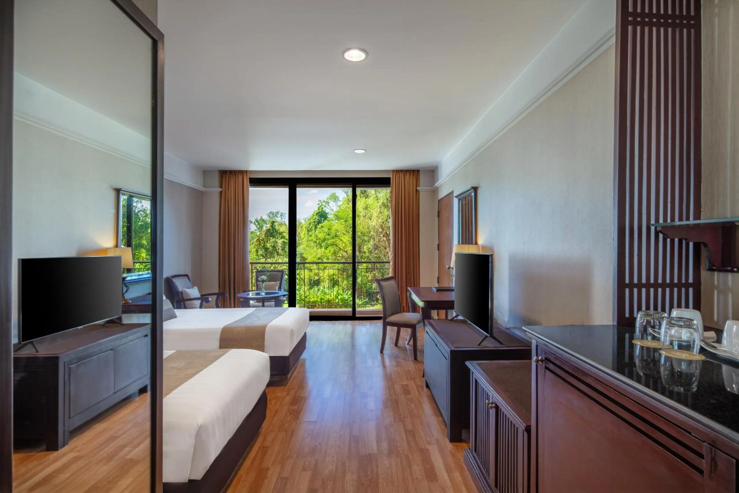 TV and multimedia in Tawa Ravadee Resort Prachinburi, a member of WorldHotels Distinctive