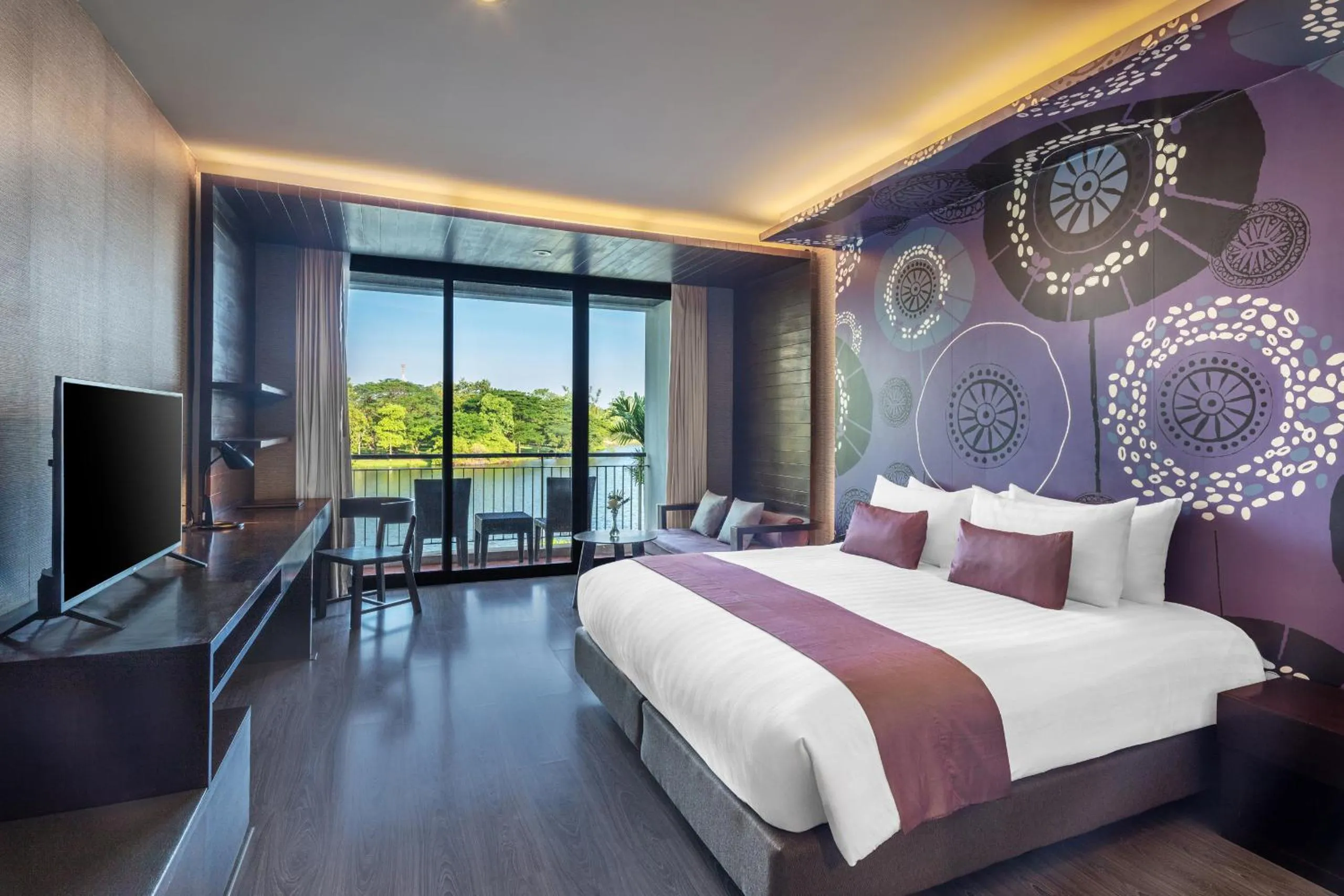 Communal lounge/ TV room, Bed in Tawa Ravadee Resort Prachinburi, a member of WorldHotels Distinctive
