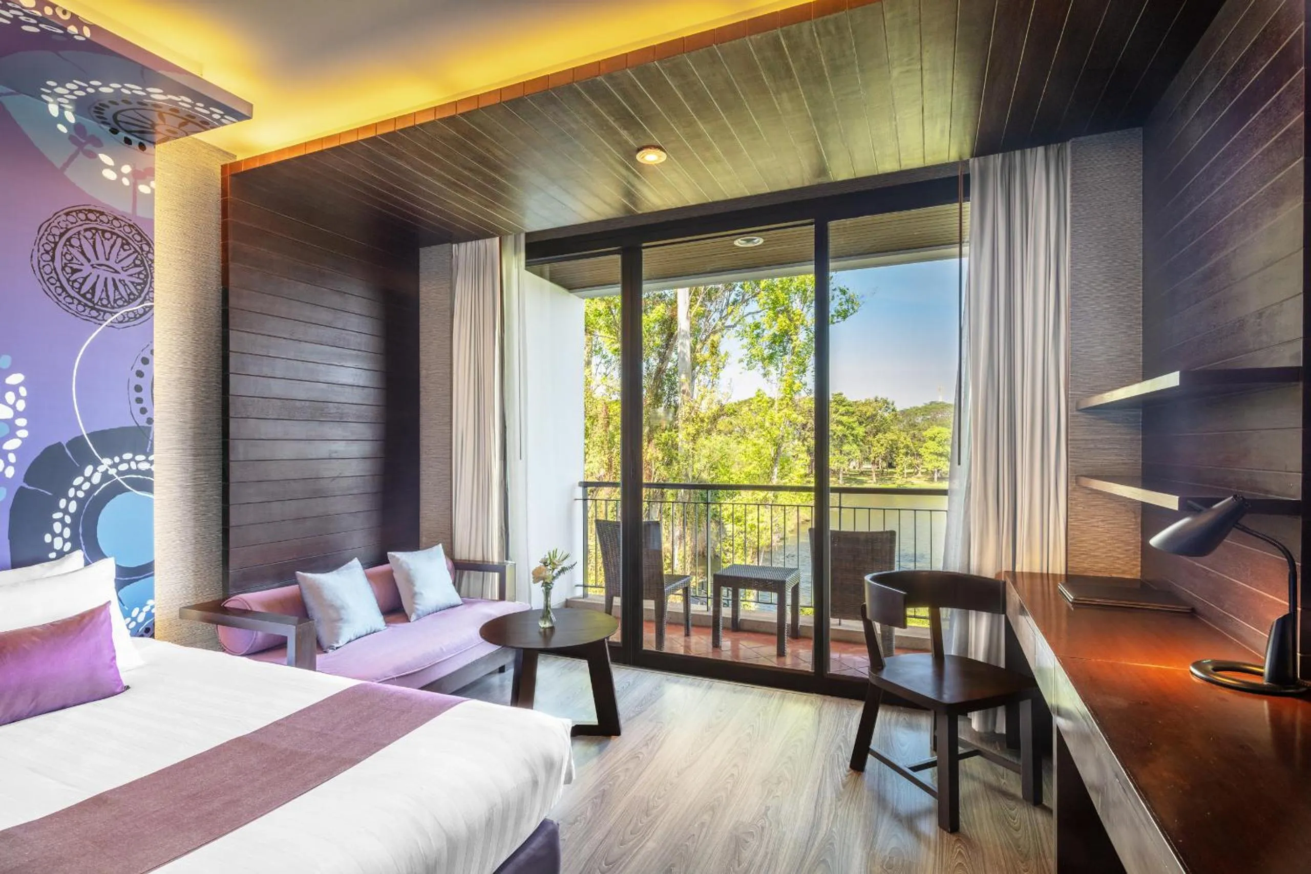 Bed in Tawa Ravadee Resort Prachinburi, a member of WorldHotels Distinctive