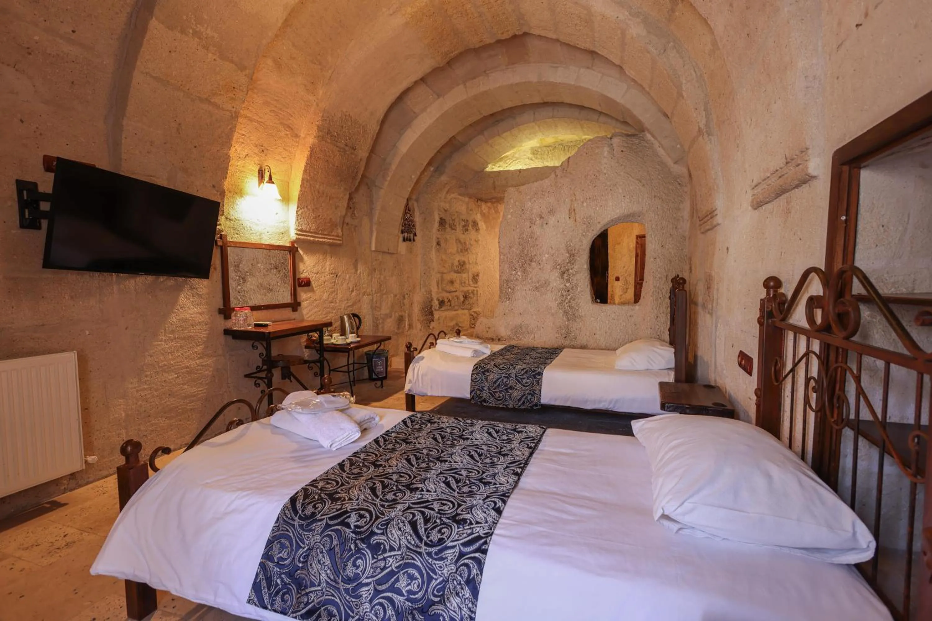 Bed in Century Cave Hotel