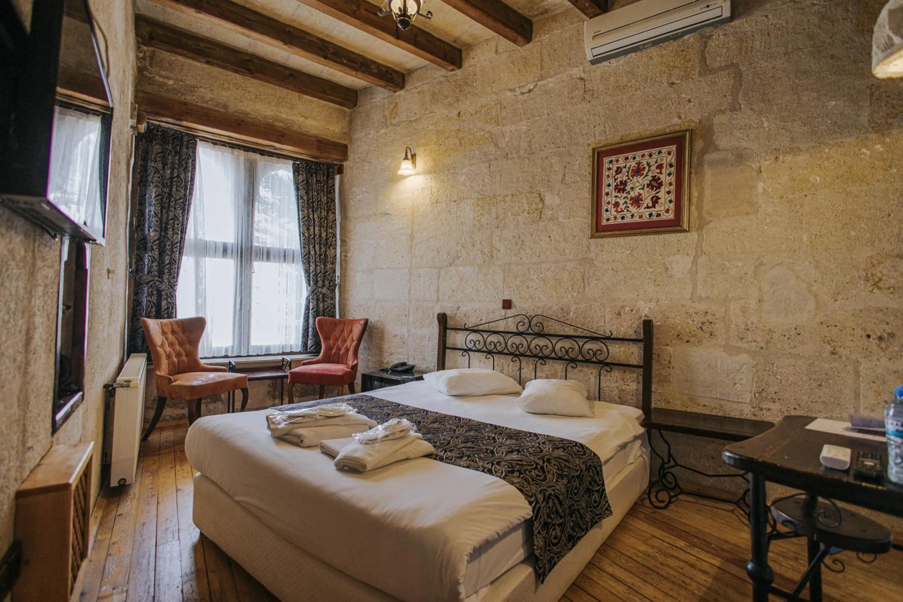 Bed in Century Cave Hotel